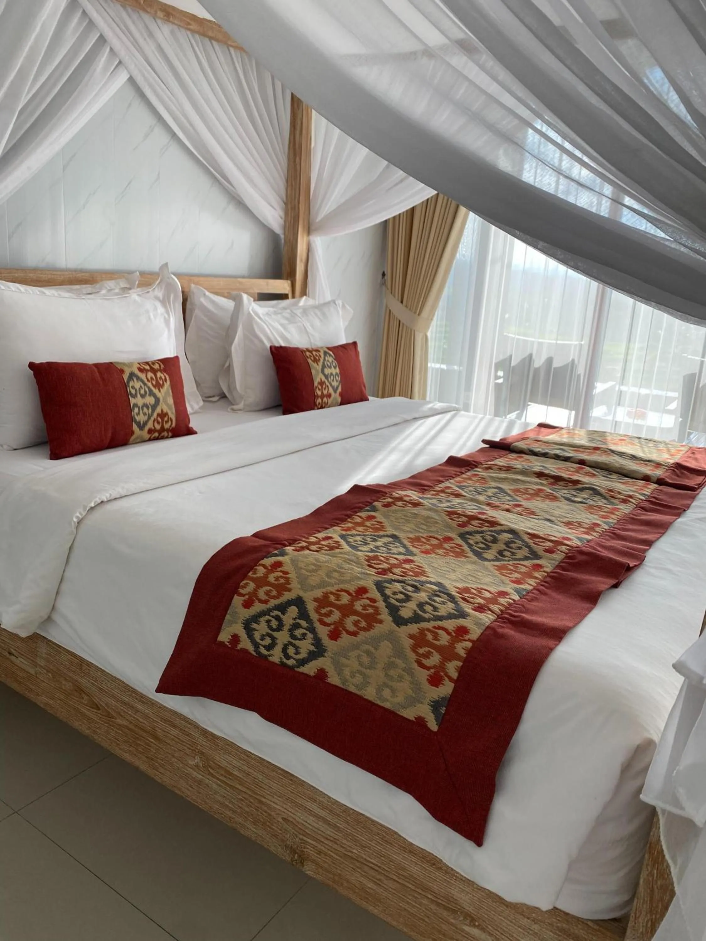 Bed in Bhuana Agung Villa and Restaurant