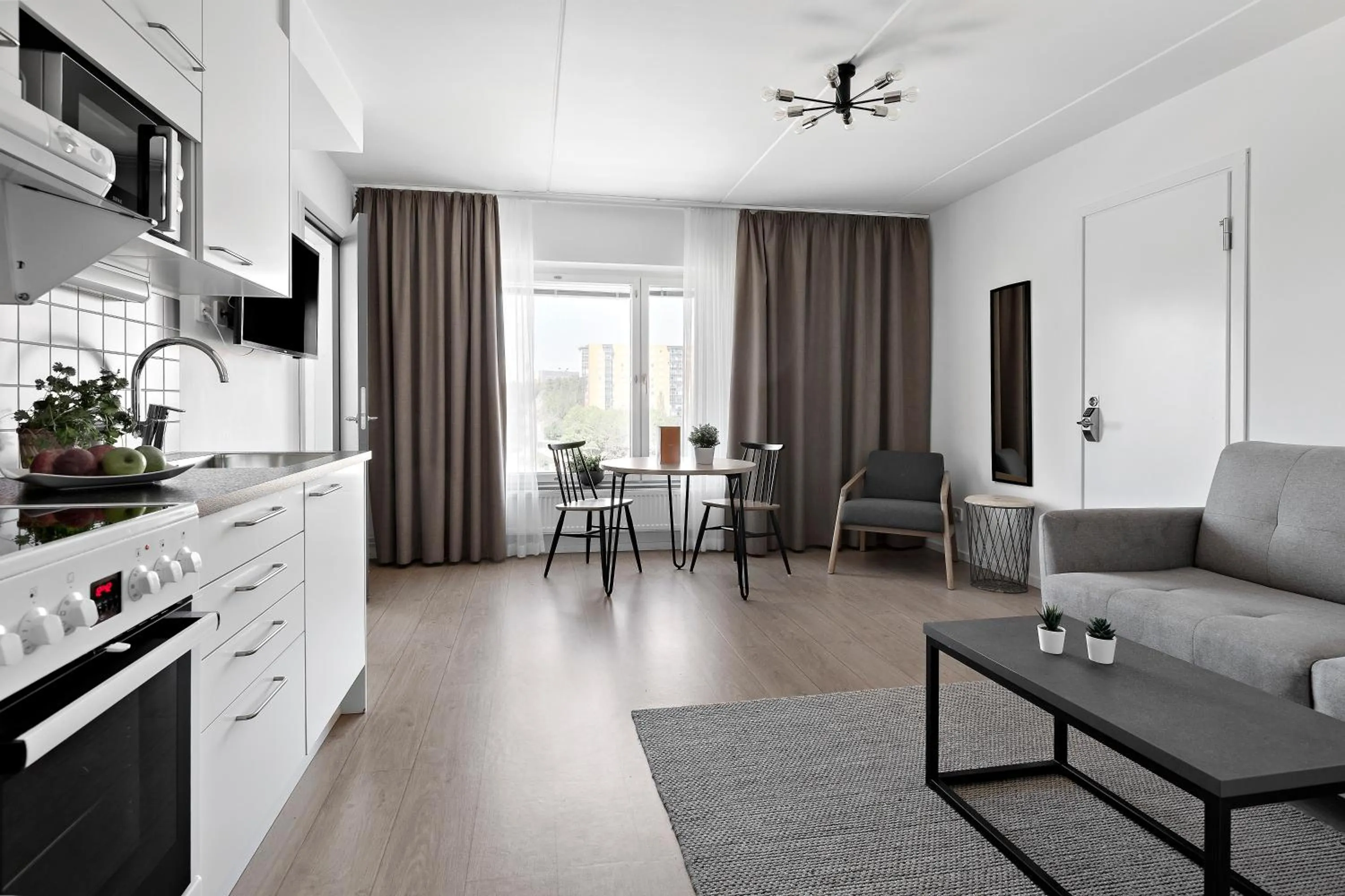 Kitchen or kitchenette in Forenom Hotel Flemingsberg - 10min from Älvsjö