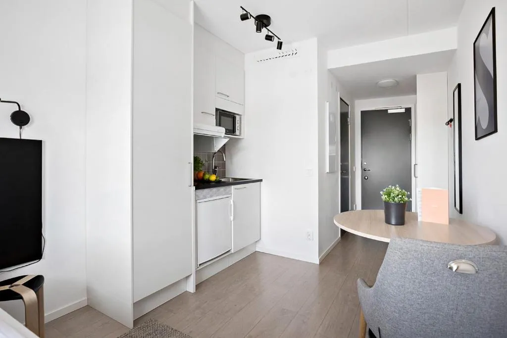 Kitchen or kitchenette in Forenom Hotel Flemingsberg - 10min from Älvsjö