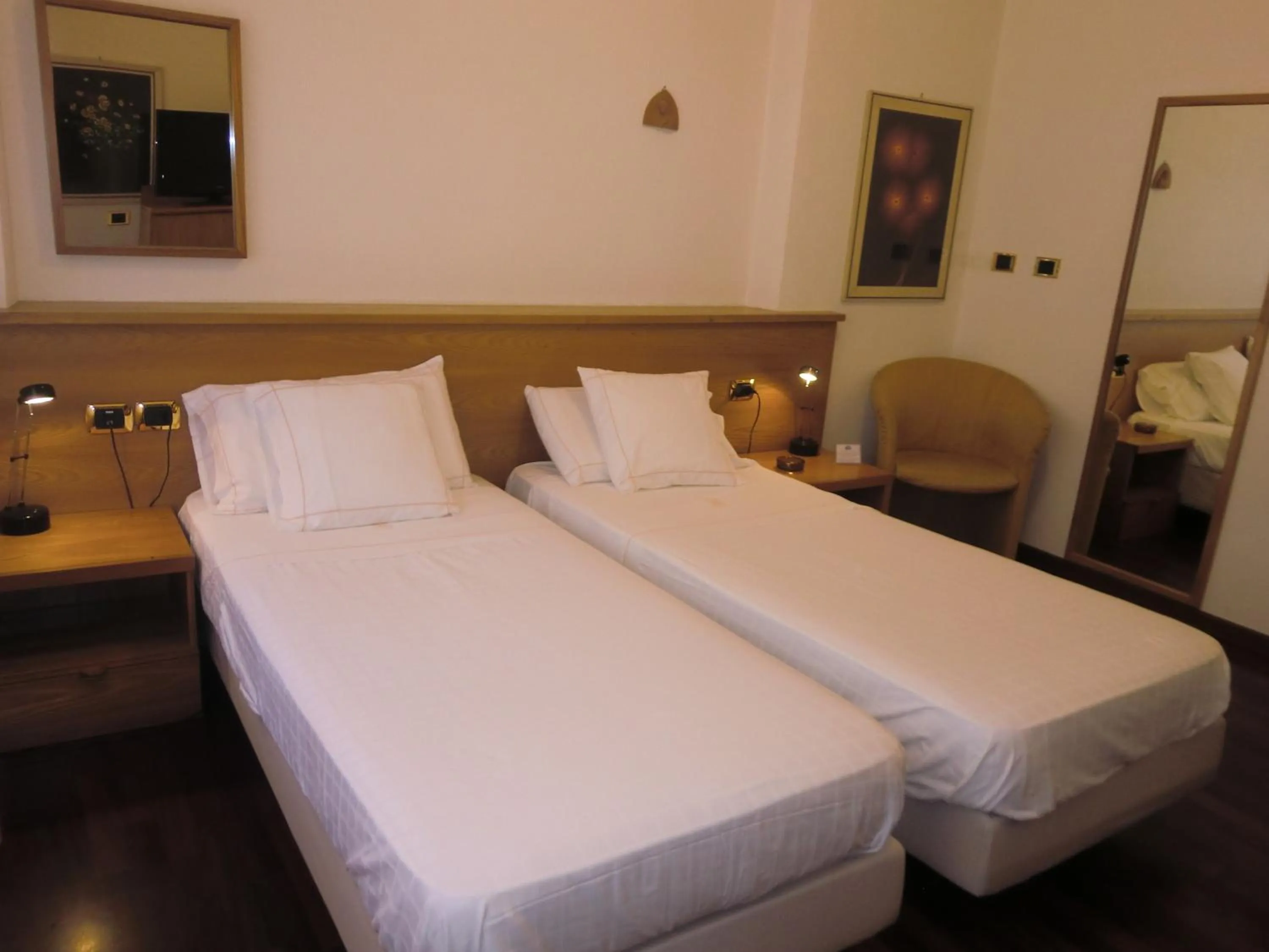 Bed in Hotel Ariston