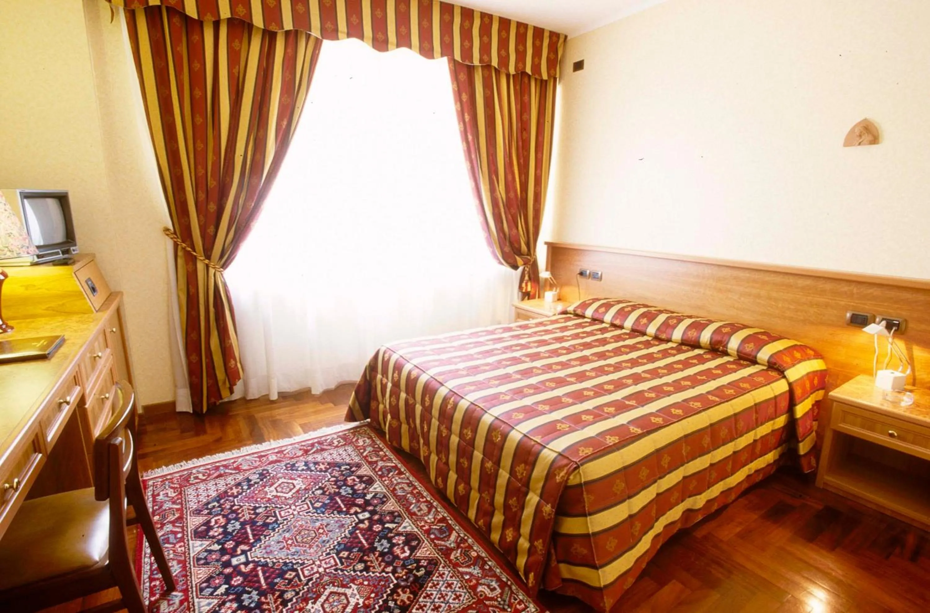 Bed in Hotel Ariston