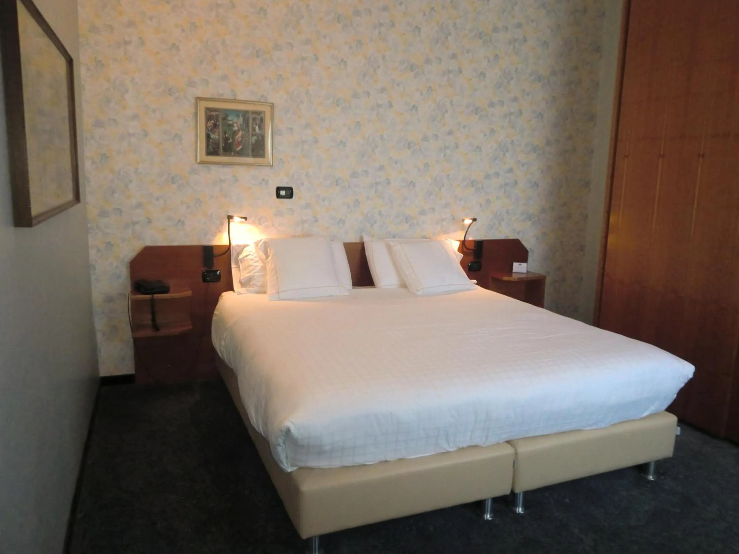 Bed in Hotel Ariston