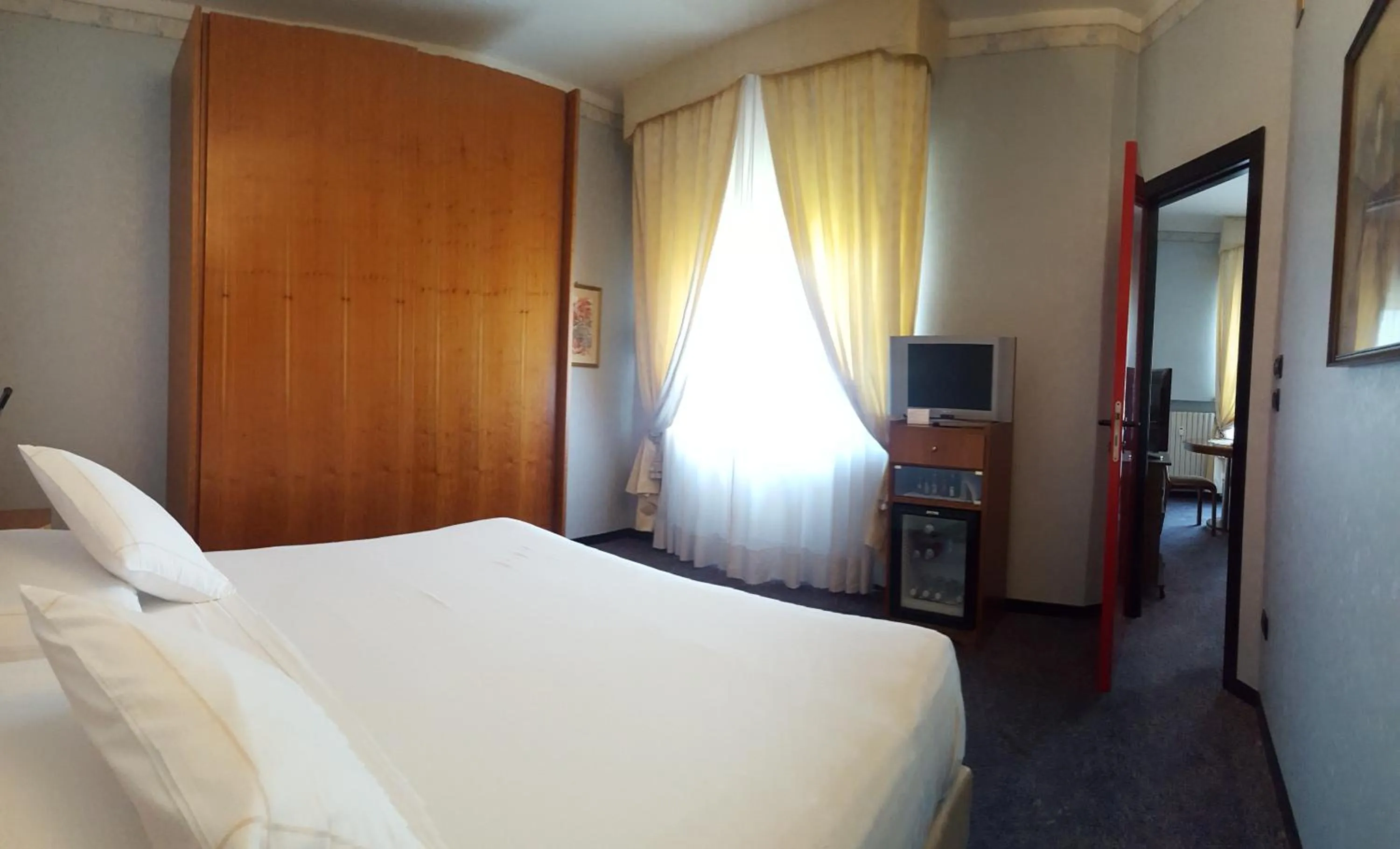 Bed in Hotel Ariston