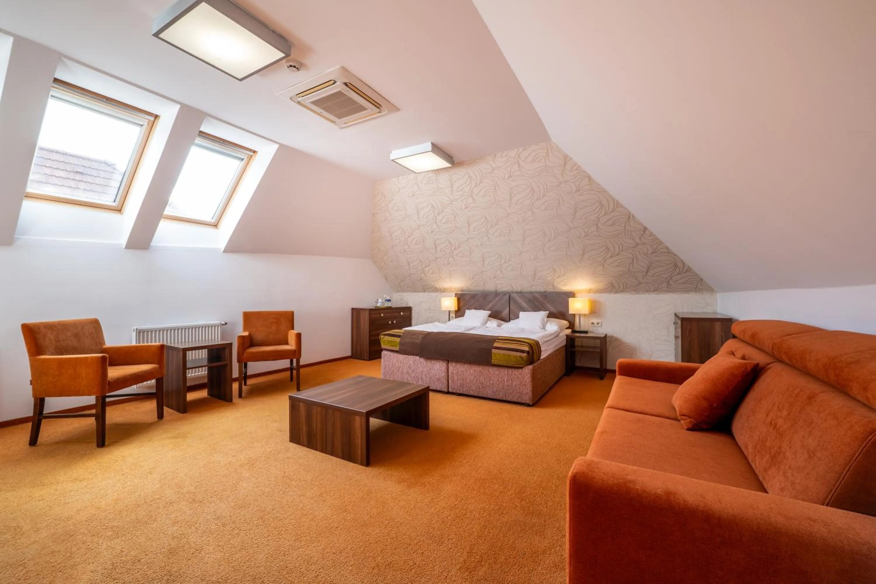 Living room, Bed in Hotel BELASSI