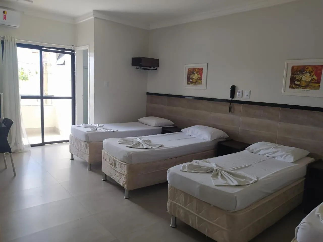 Bed in Tropical Praia Hotel