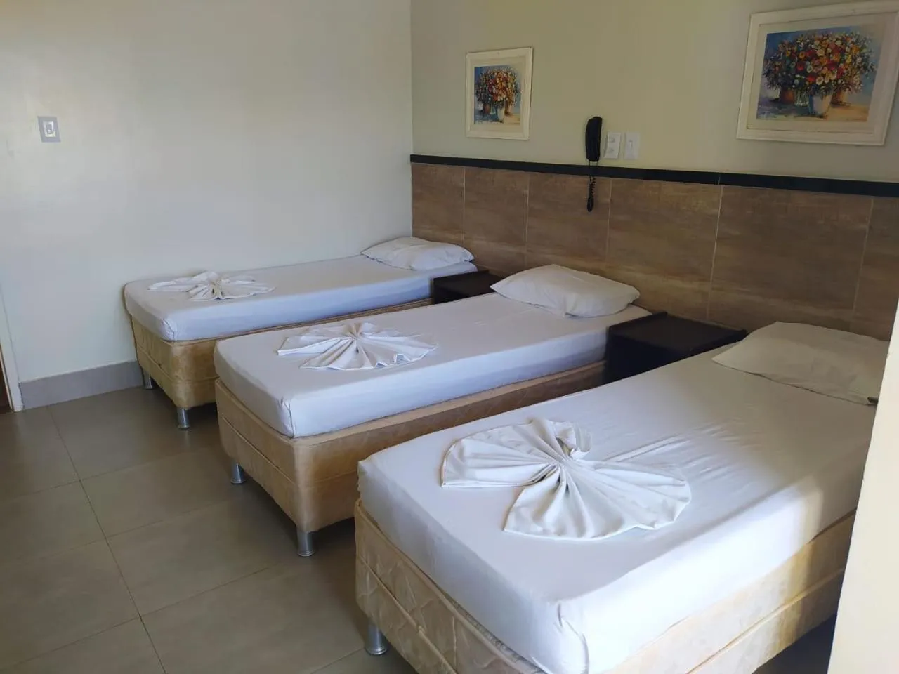 Bed in Tropical Praia Hotel