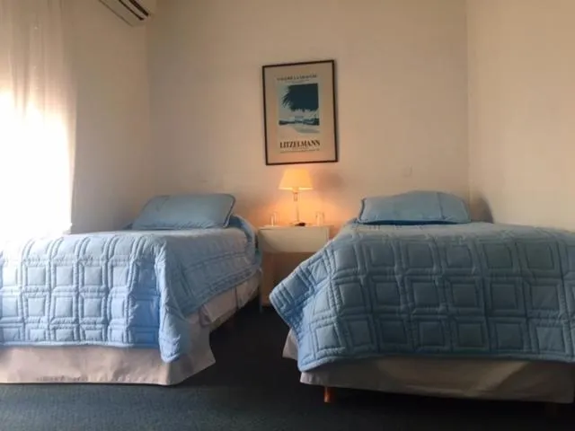 Bed in Aqua Hotel