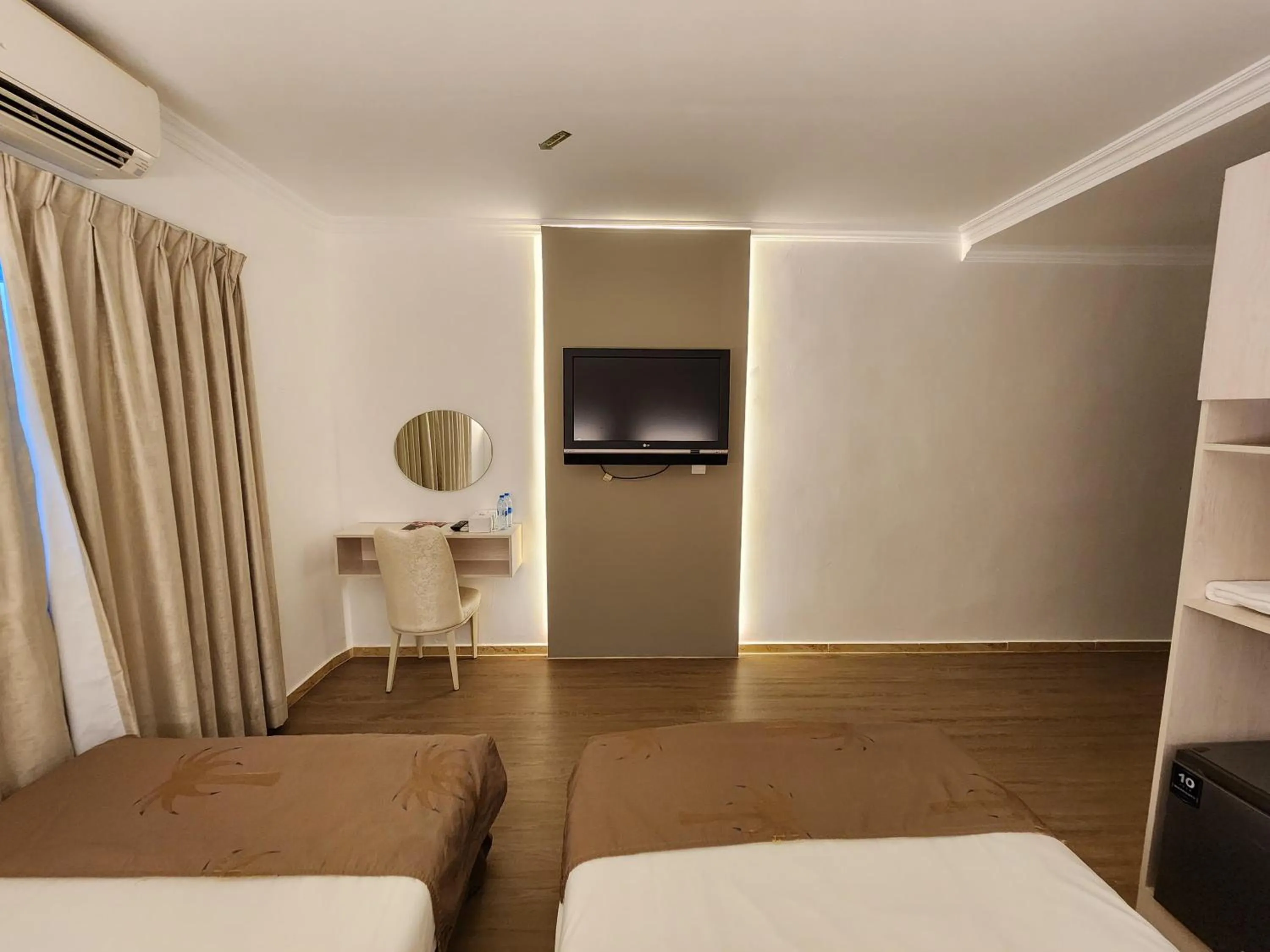 Bed in Sharjah International Airport Hotel