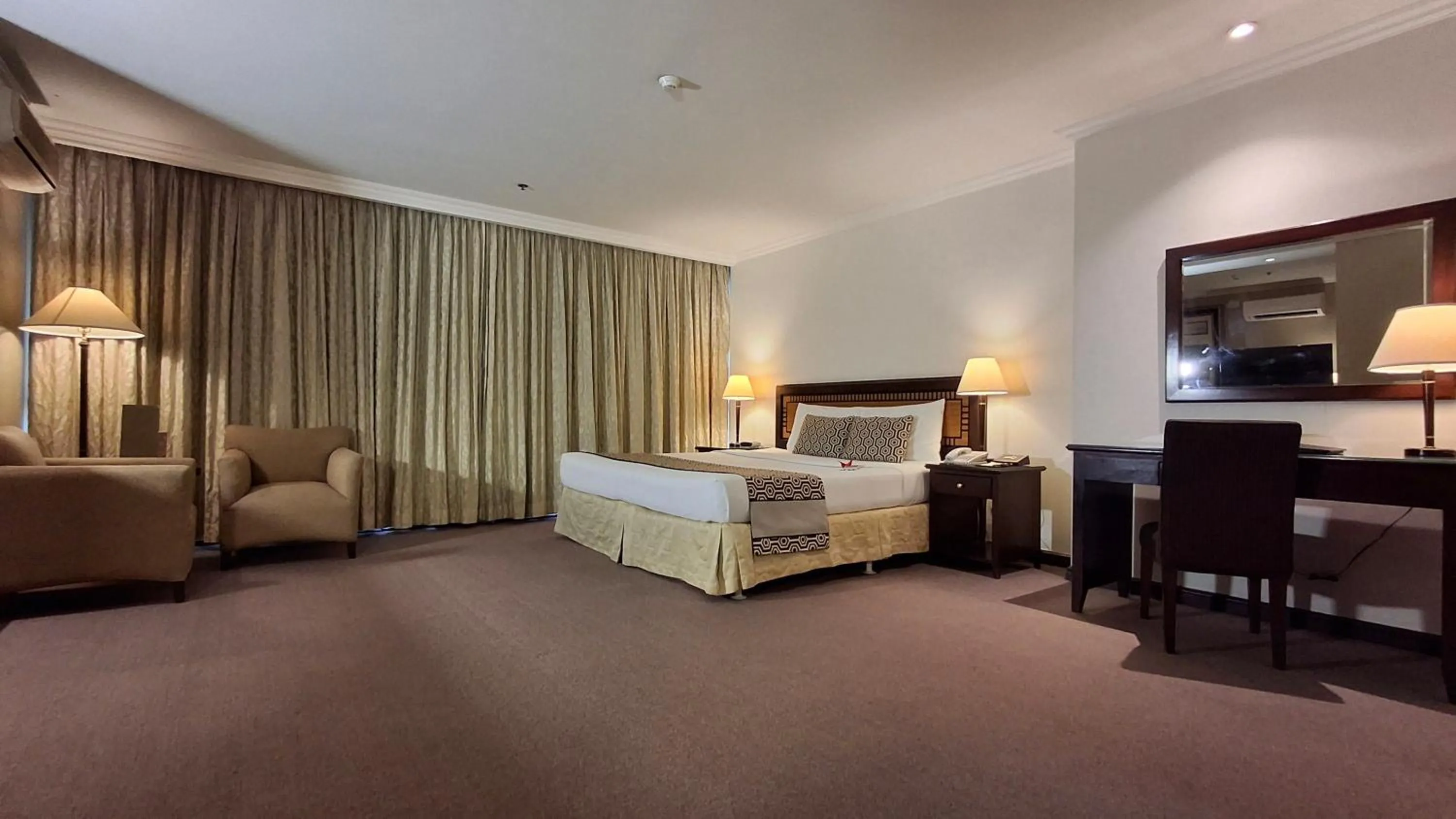 Bed in Herald Suites Solana