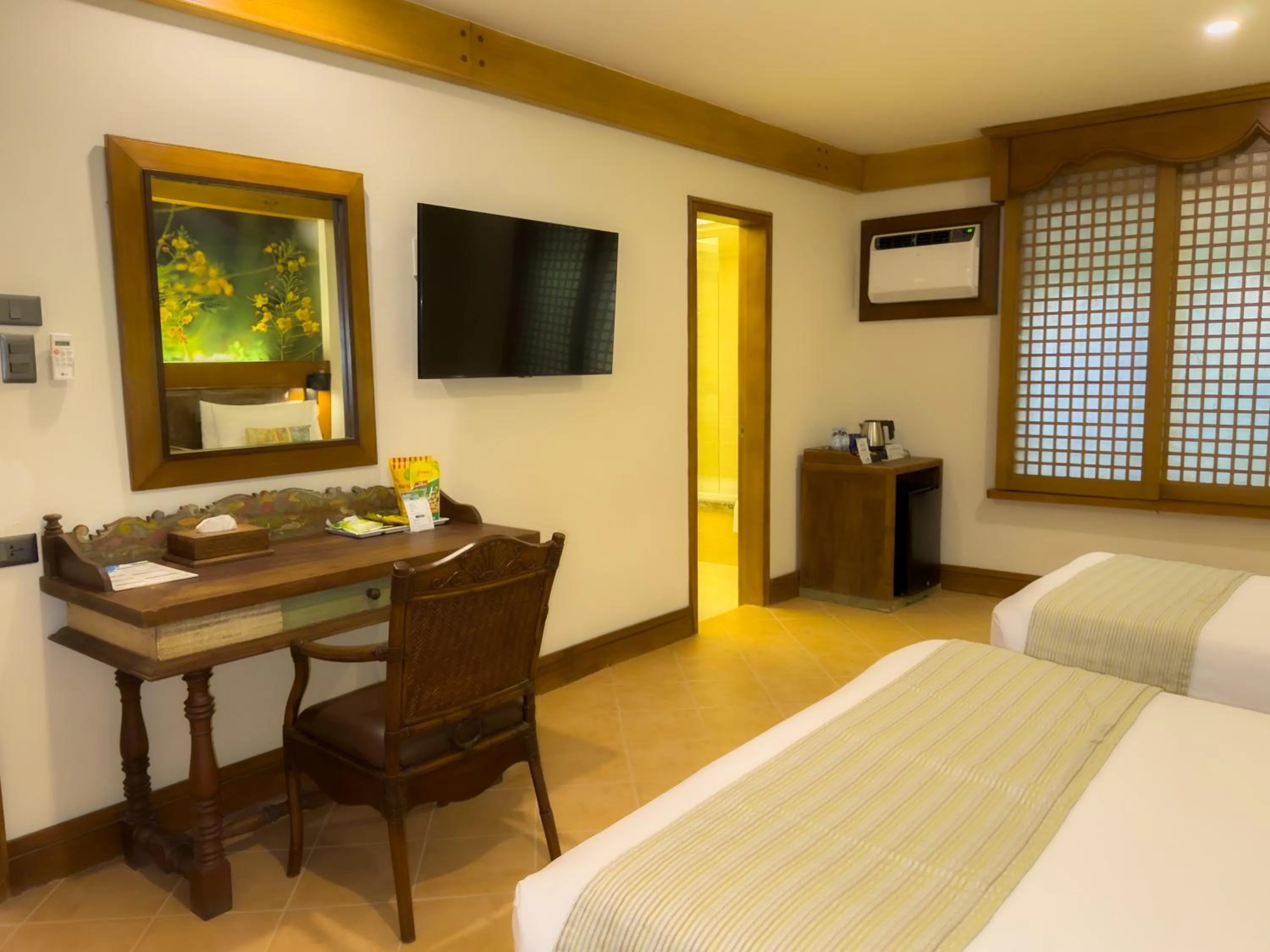 Seating area, Bed in Costabella Tropical Beach Hotel