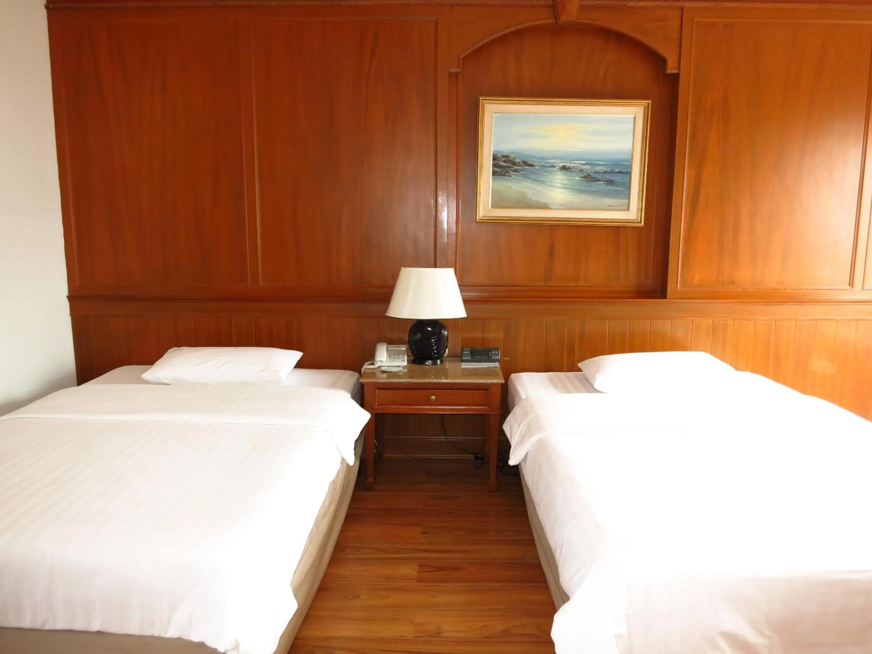 Bed in Sirin Hotel Hua Hin