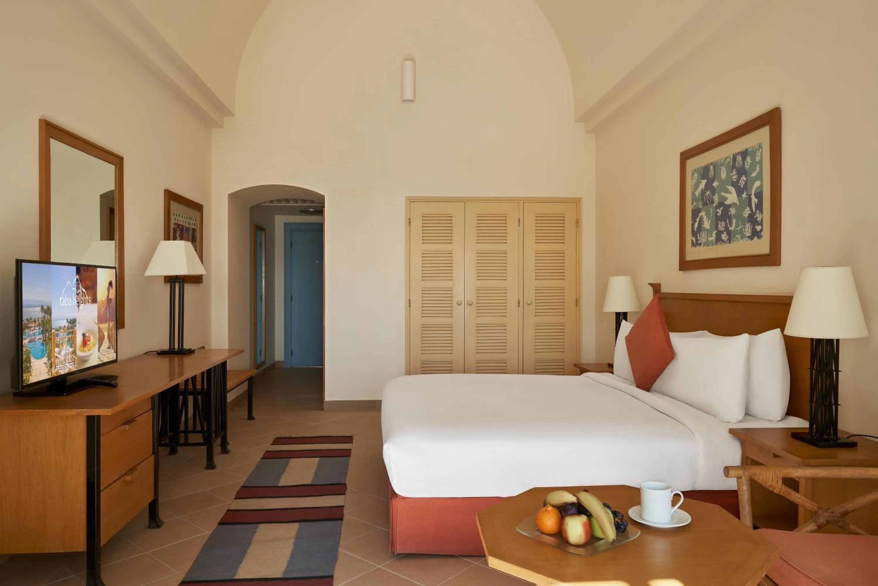 Photo of the whole room, Bed in Strand Beach Resort