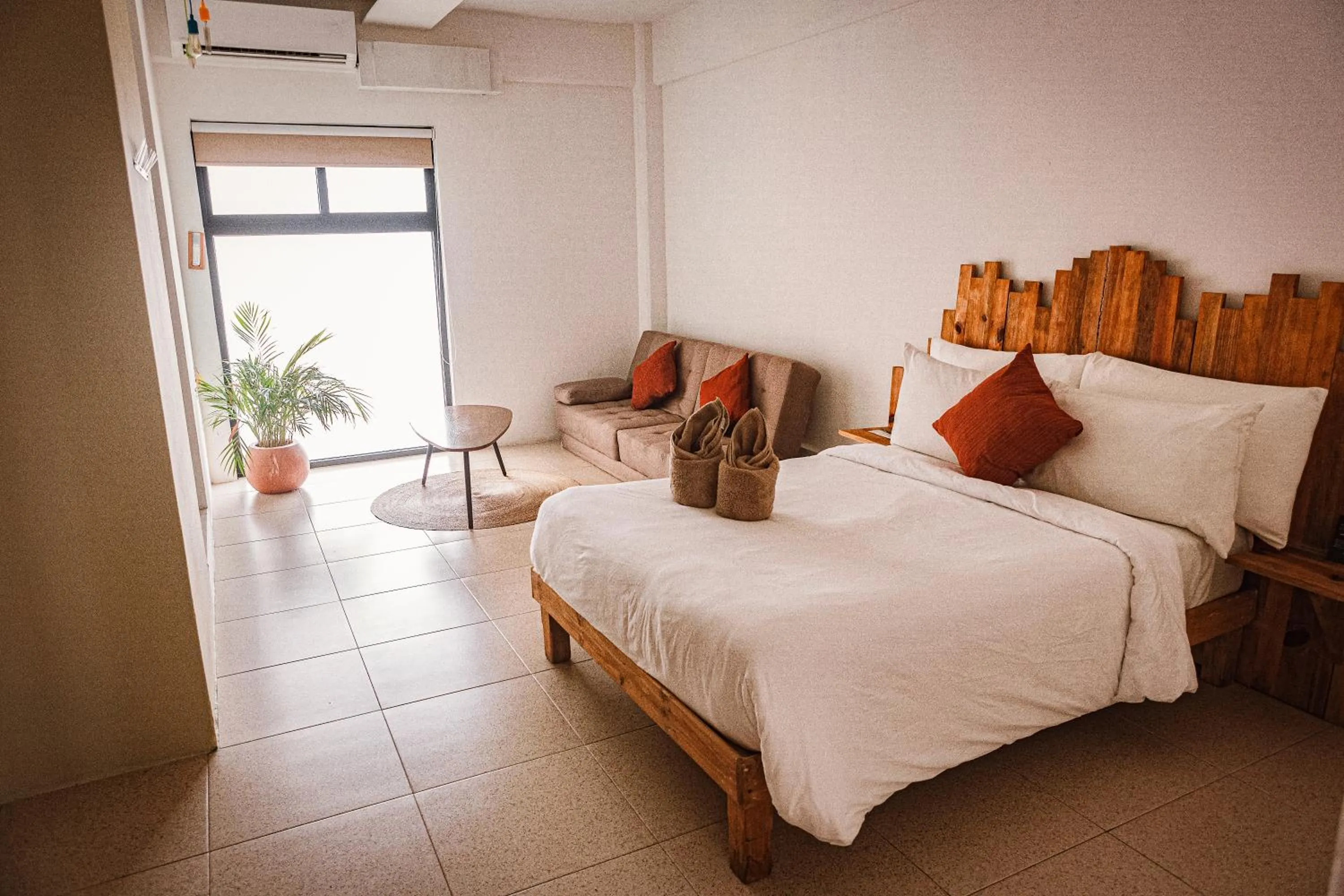 Bed in Nomads Hotel & Rooftop Pool Cancun