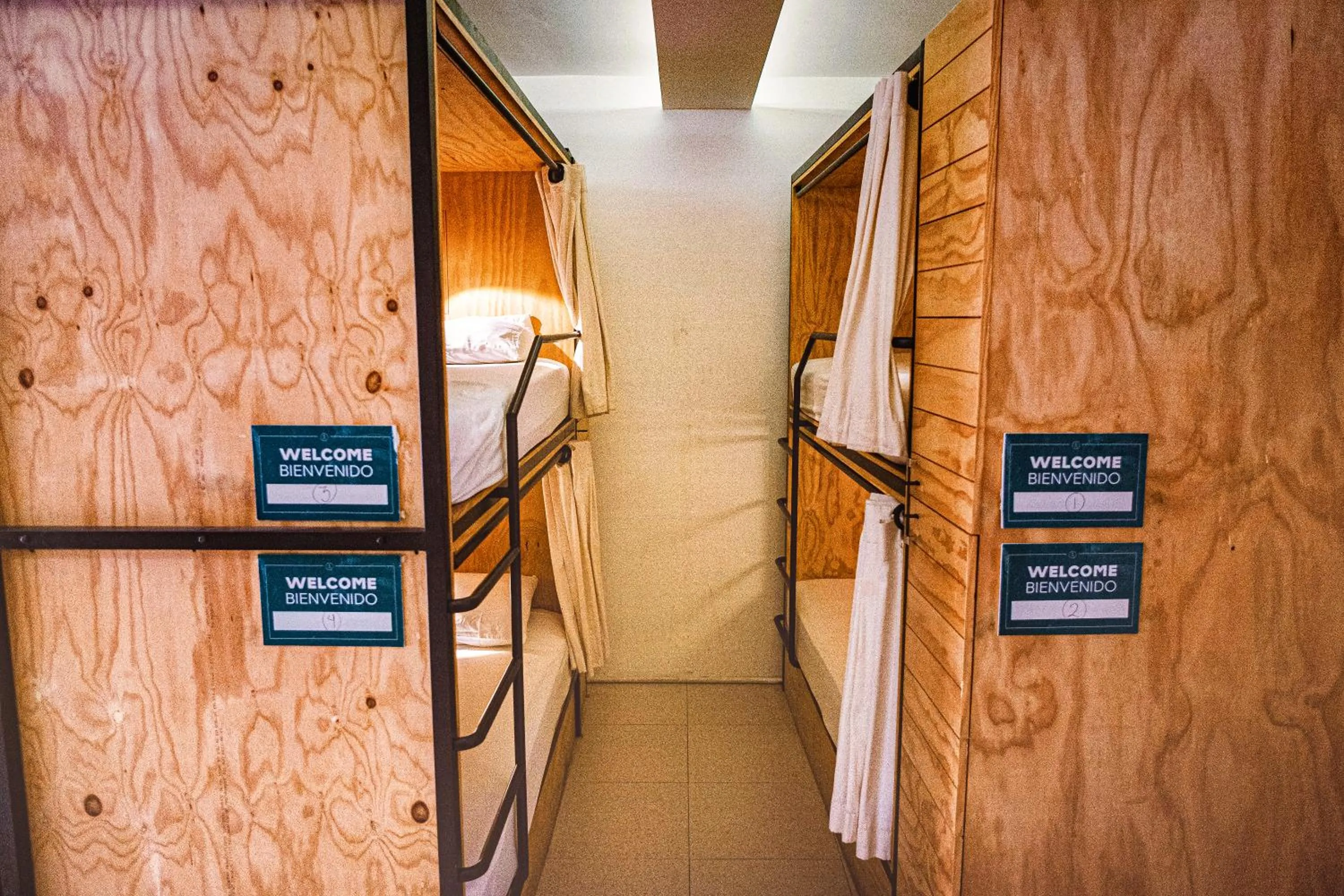 Bed in Nomads Hotel & Rooftop Pool Cancun