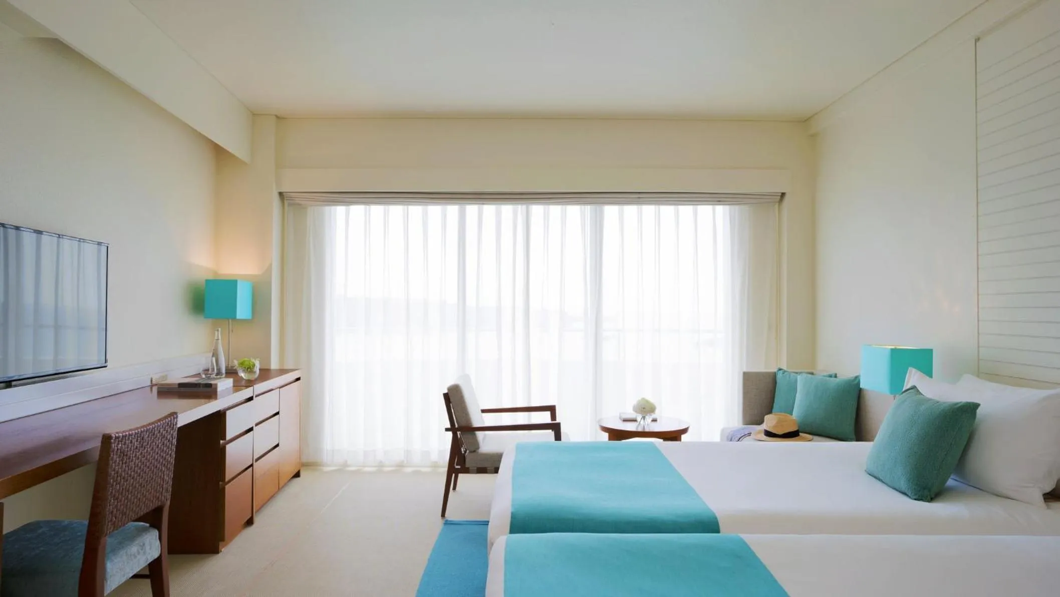 Photo of the whole room, Bed in ANA InterContinental Manza Beach Resort by IHG