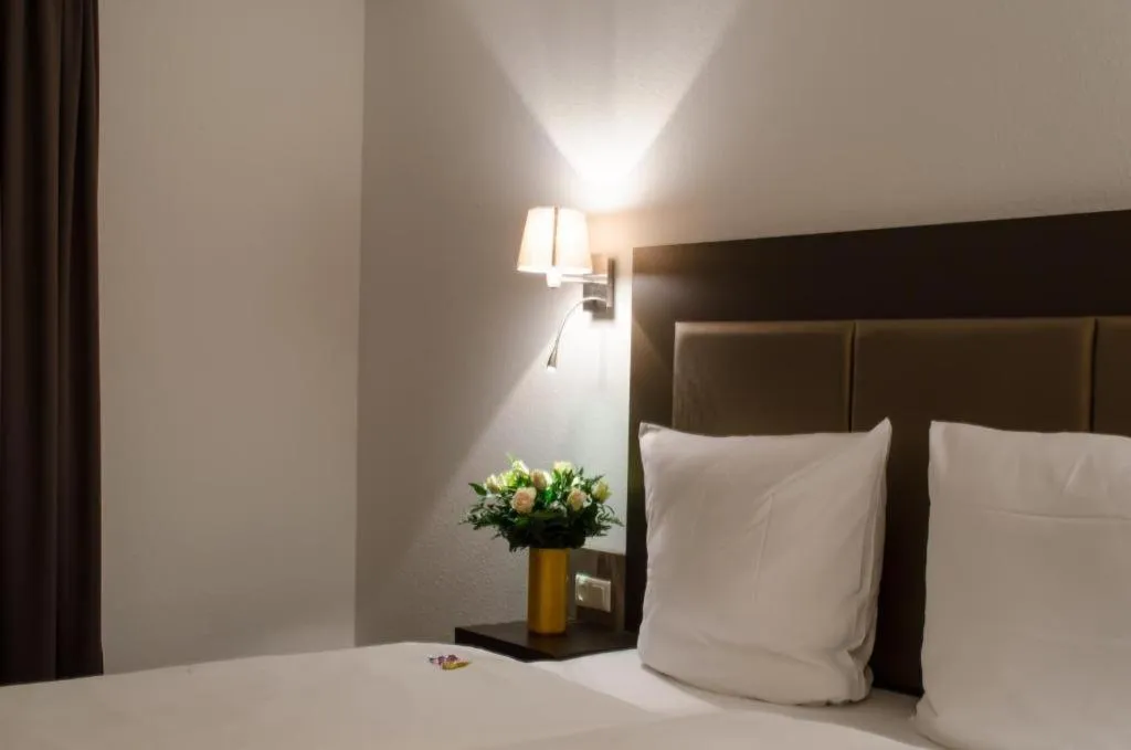 Bed in City Hotel Wiesbaden