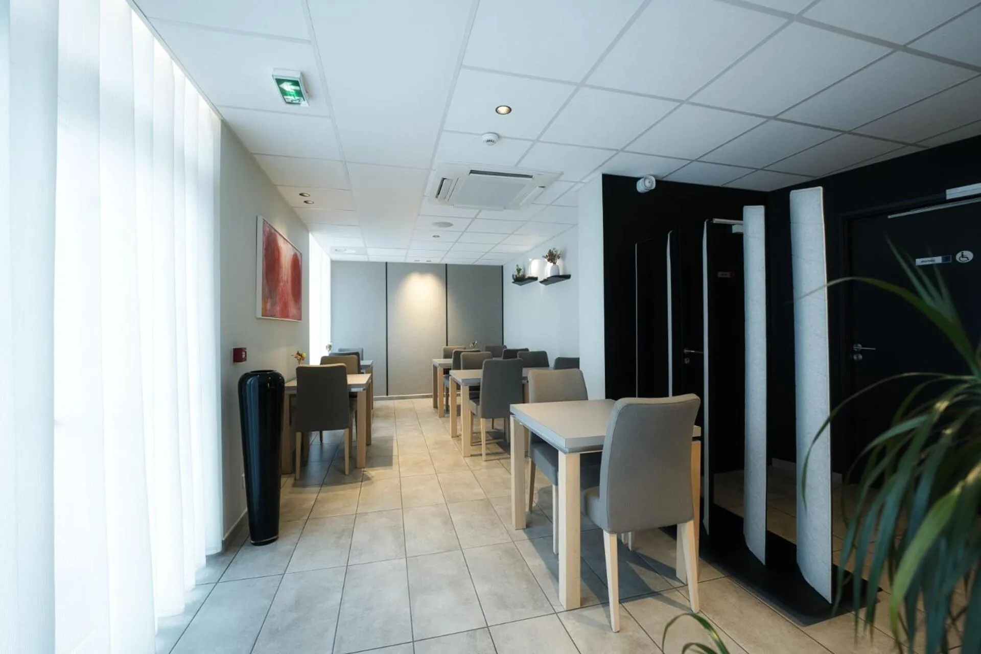 Seating area in Logis Restaurant & Hôtel À la 12