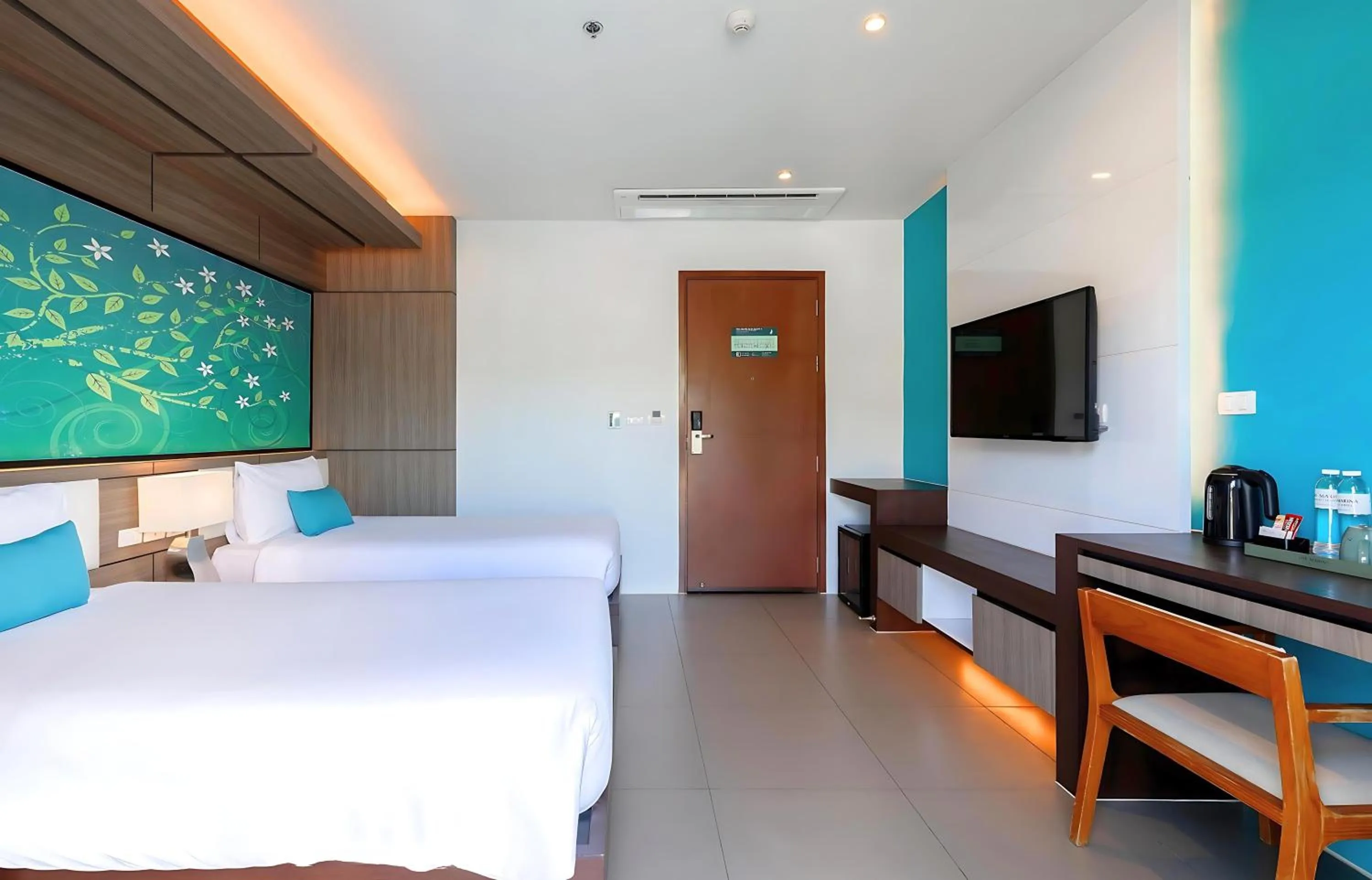 Photo of the whole room, Bed in The Marina Phuket Hotel