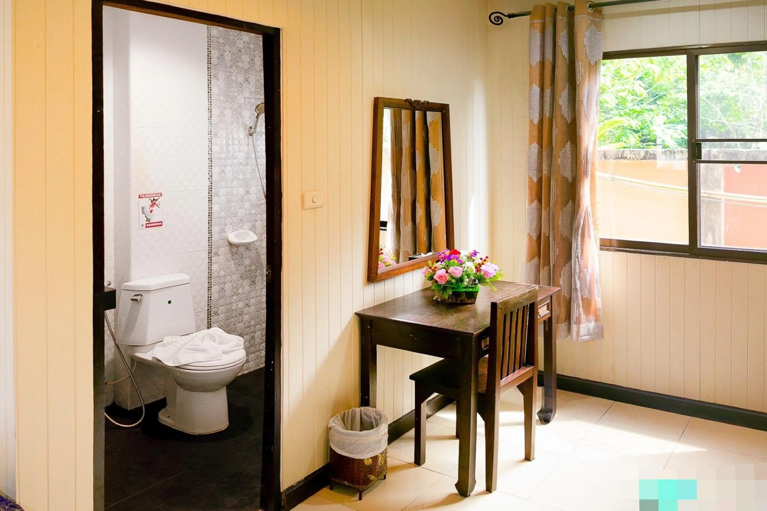 Toilet in Kasalong Resort and Spa Pattaya