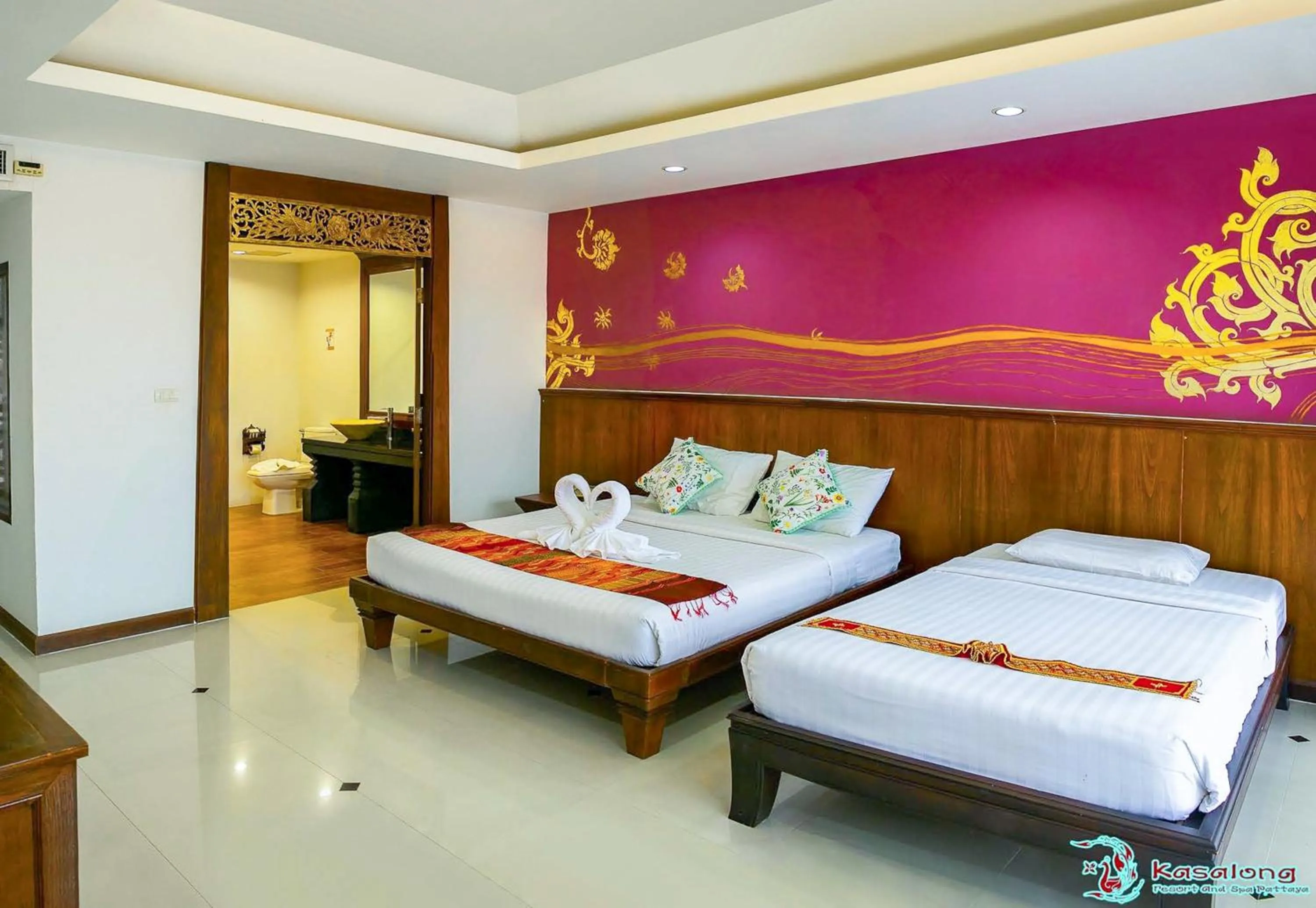 Bed in Kasalong Resort and Spa Pattaya