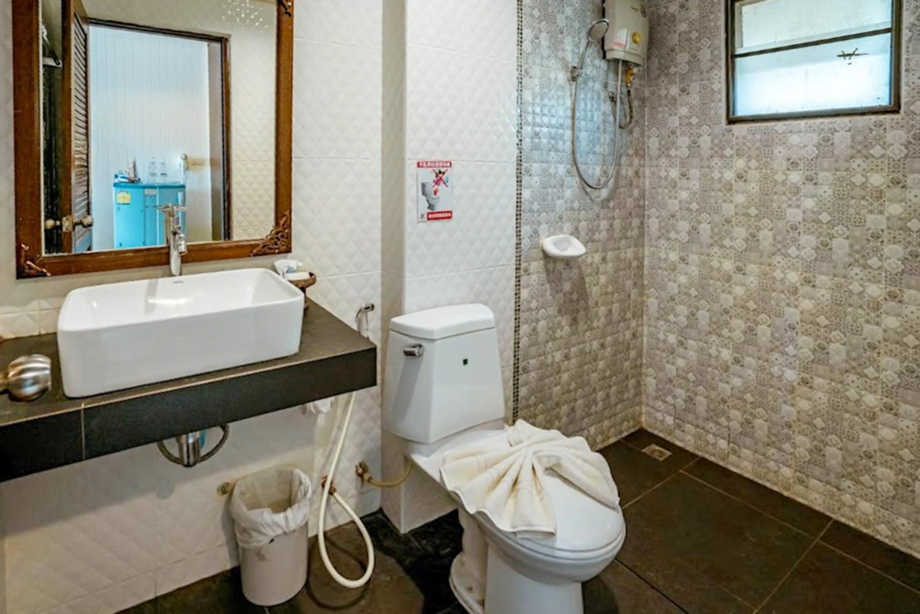 Shower in Kasalong Resort and Spa Pattaya