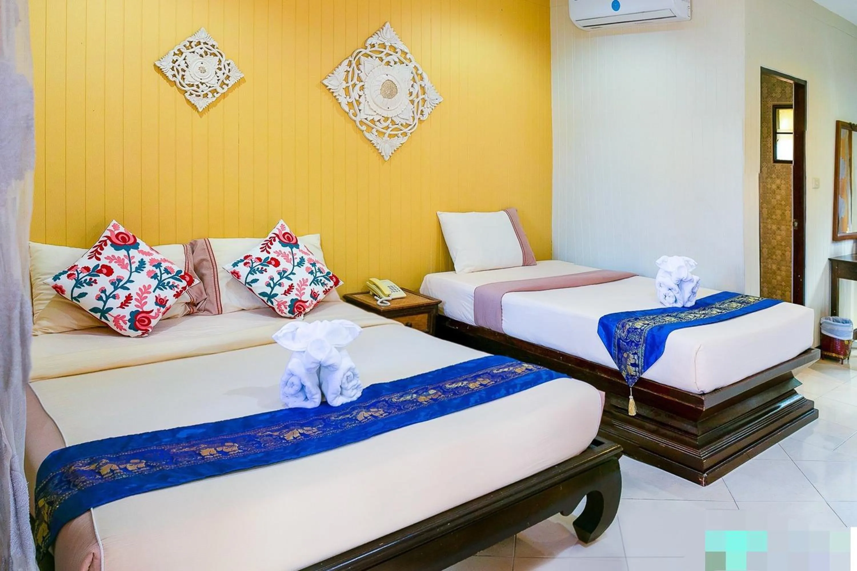 Bed in Kasalong Resort and Spa Pattaya