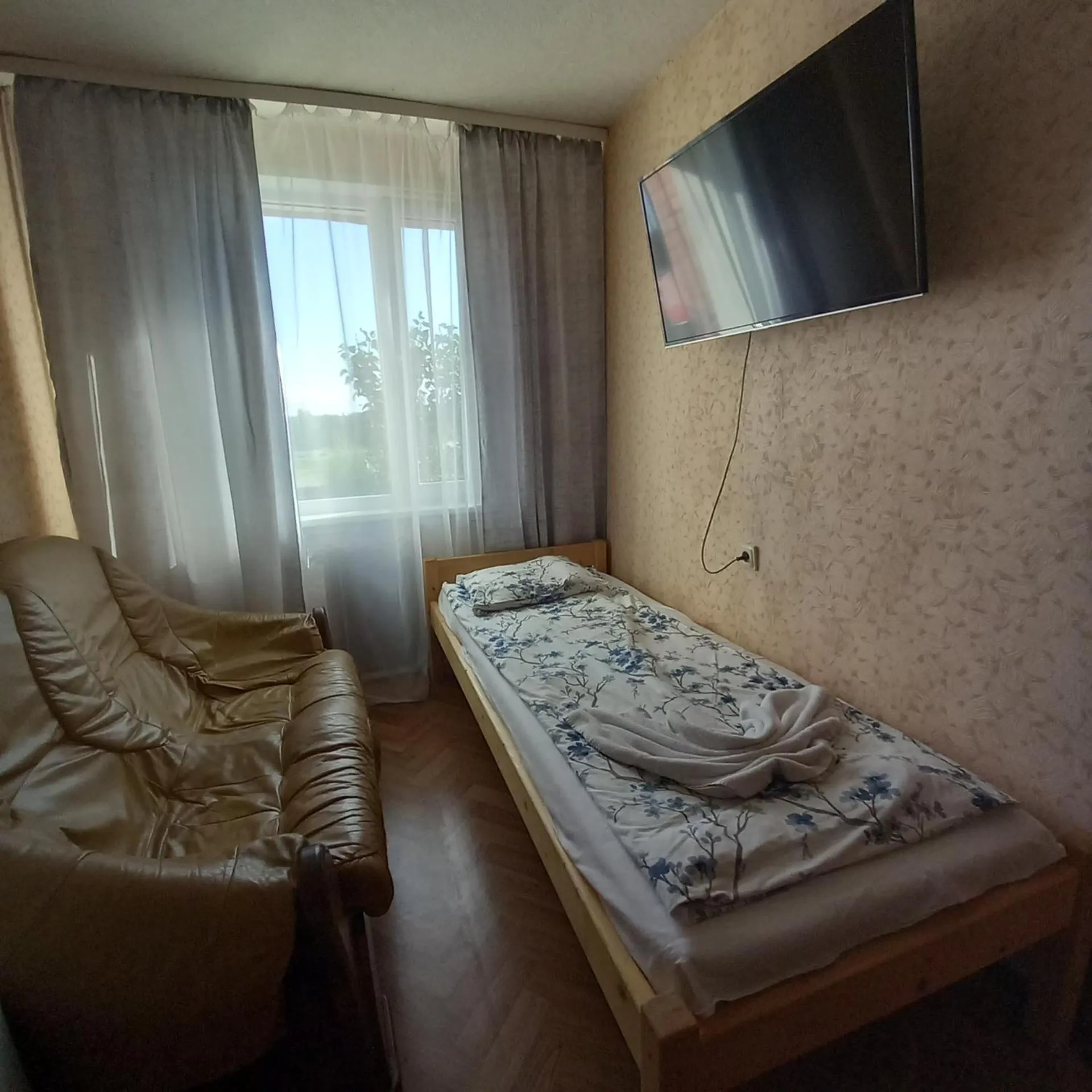 Bed in Riverside Motel Jelgava