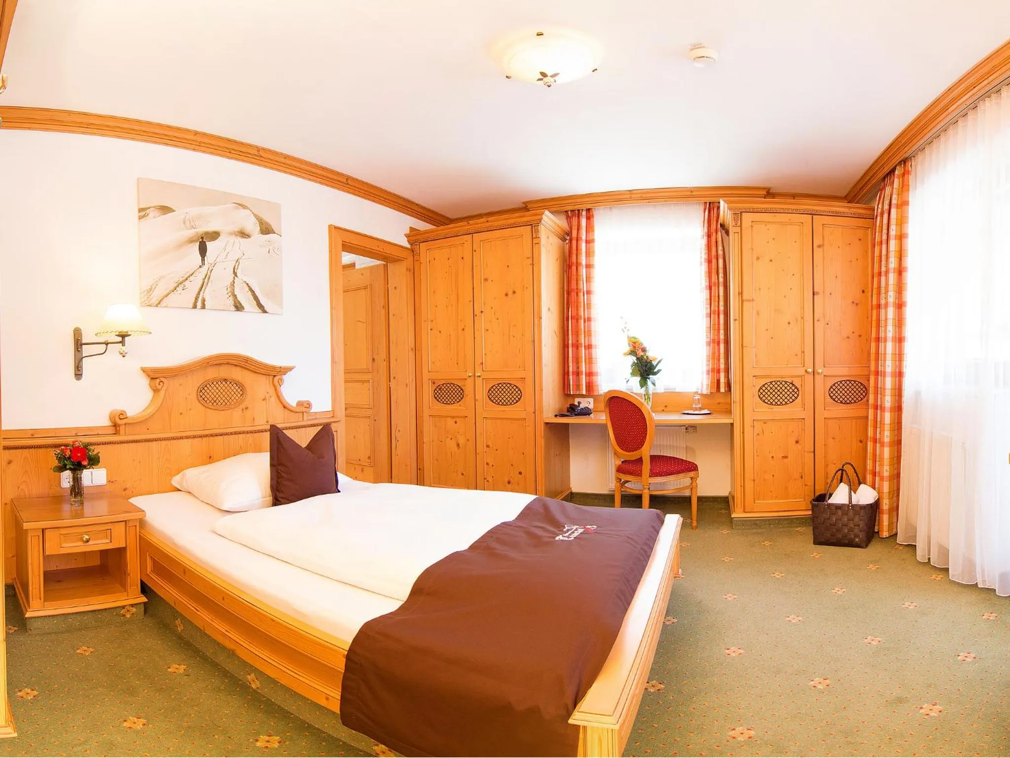 Bed in Alpenhotel Tirolerhof