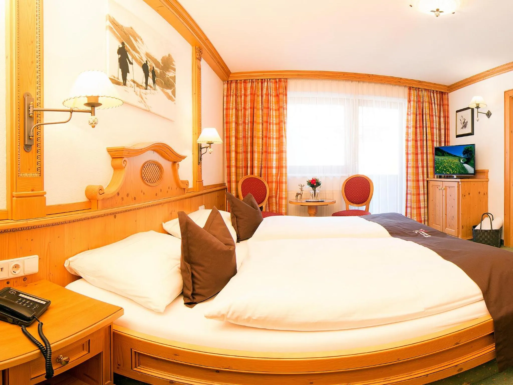 Bed in Alpenhotel Tirolerhof