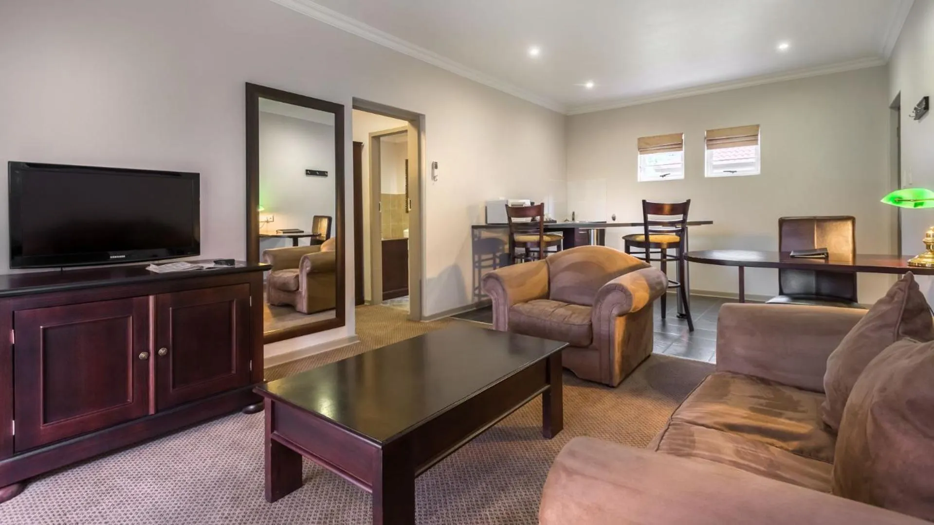 Communal lounge/ TV room in ANEW Hotel Witbank Emalahleni