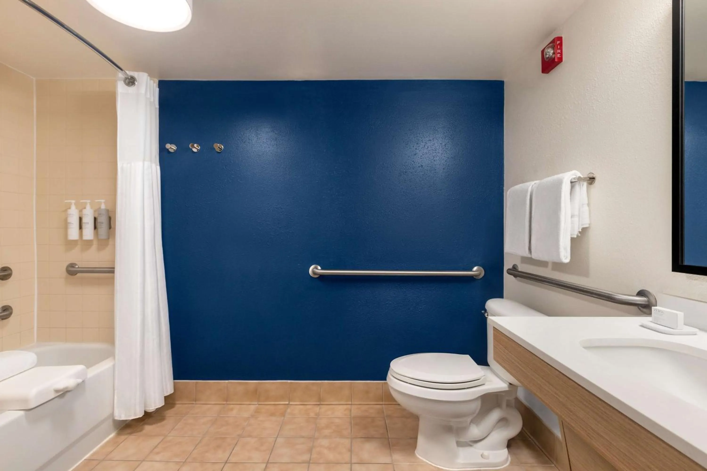 Bathroom in Spark by Hilton Orlando Universal Boulevard