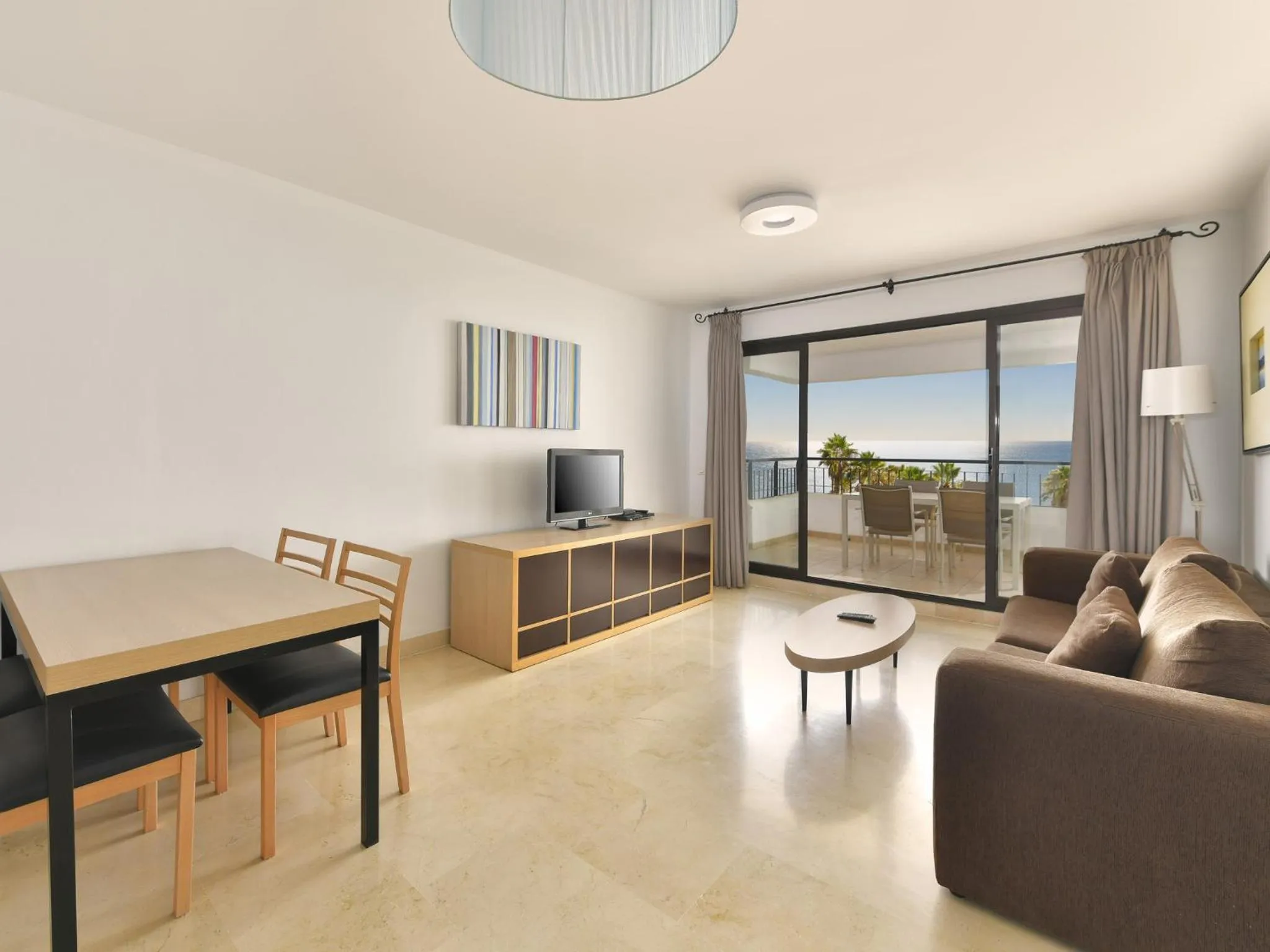 TV and multimedia in Olée Nerja Holiday Rentals by Fuerte Group