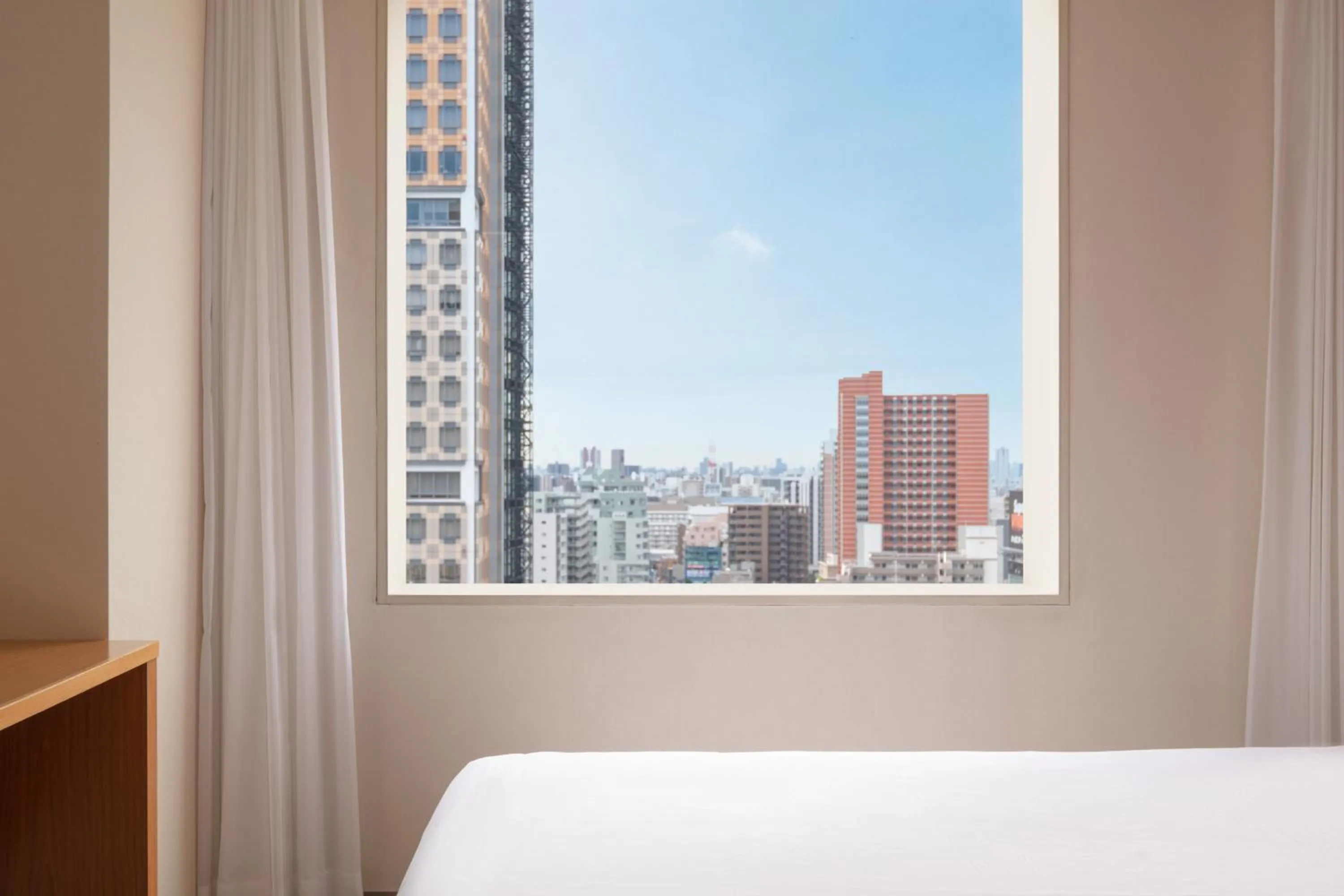 Photo of the whole room, Bed in The Mark Grand Hotel