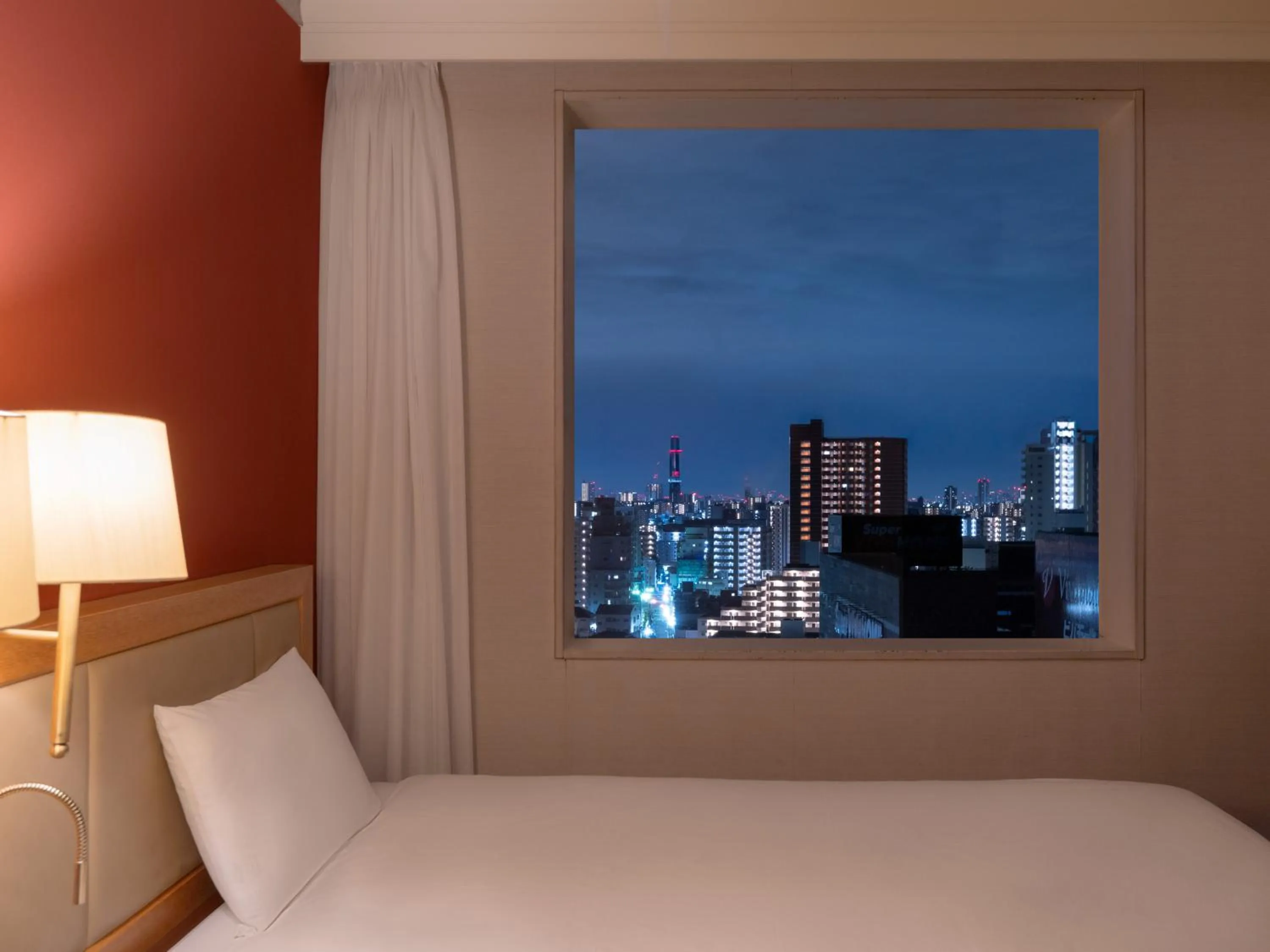 Bed in The Mark Grand Hotel