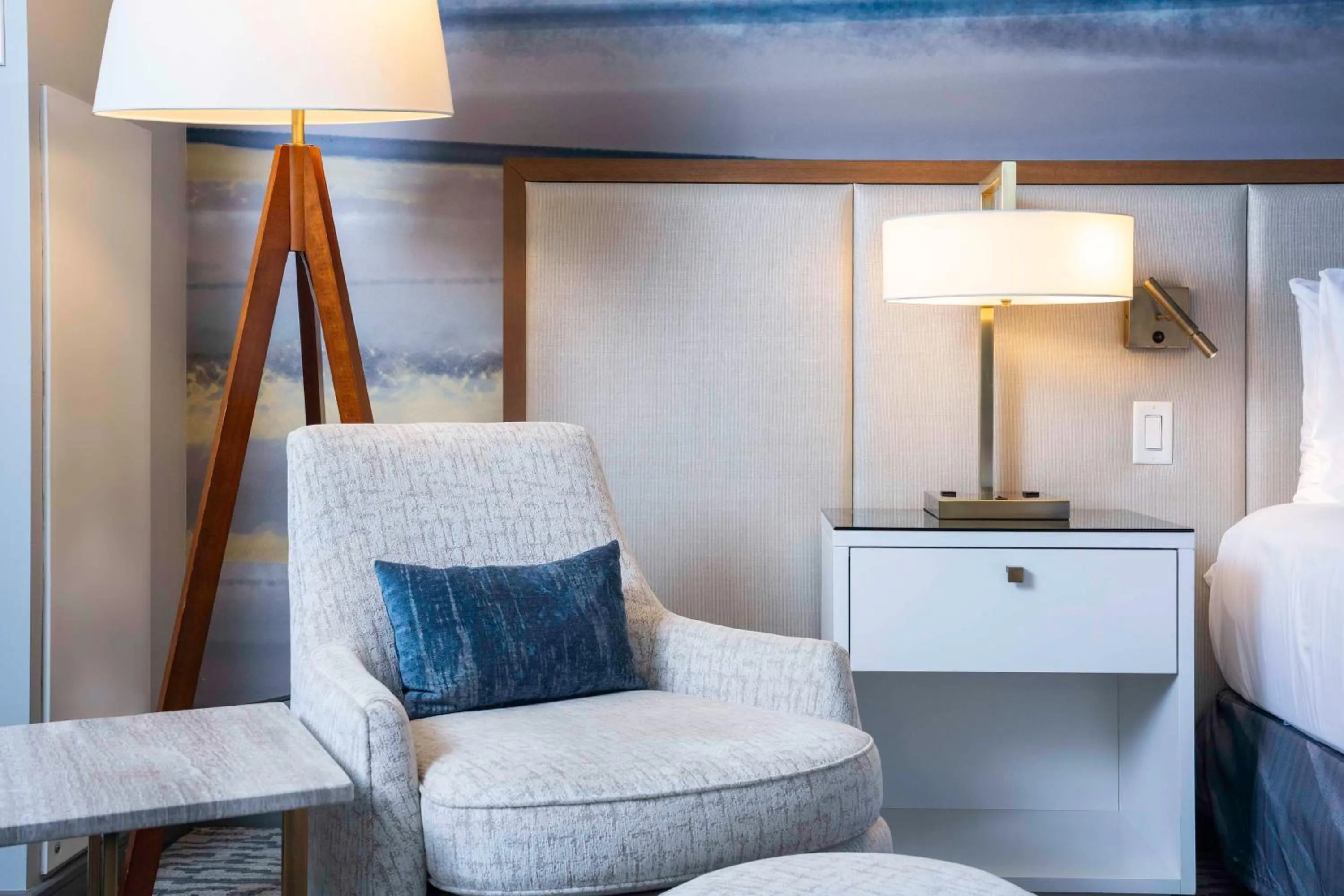 Living room, Bed in The Lofton Hotel Minneapolis, Tapestry Collection by Hilton