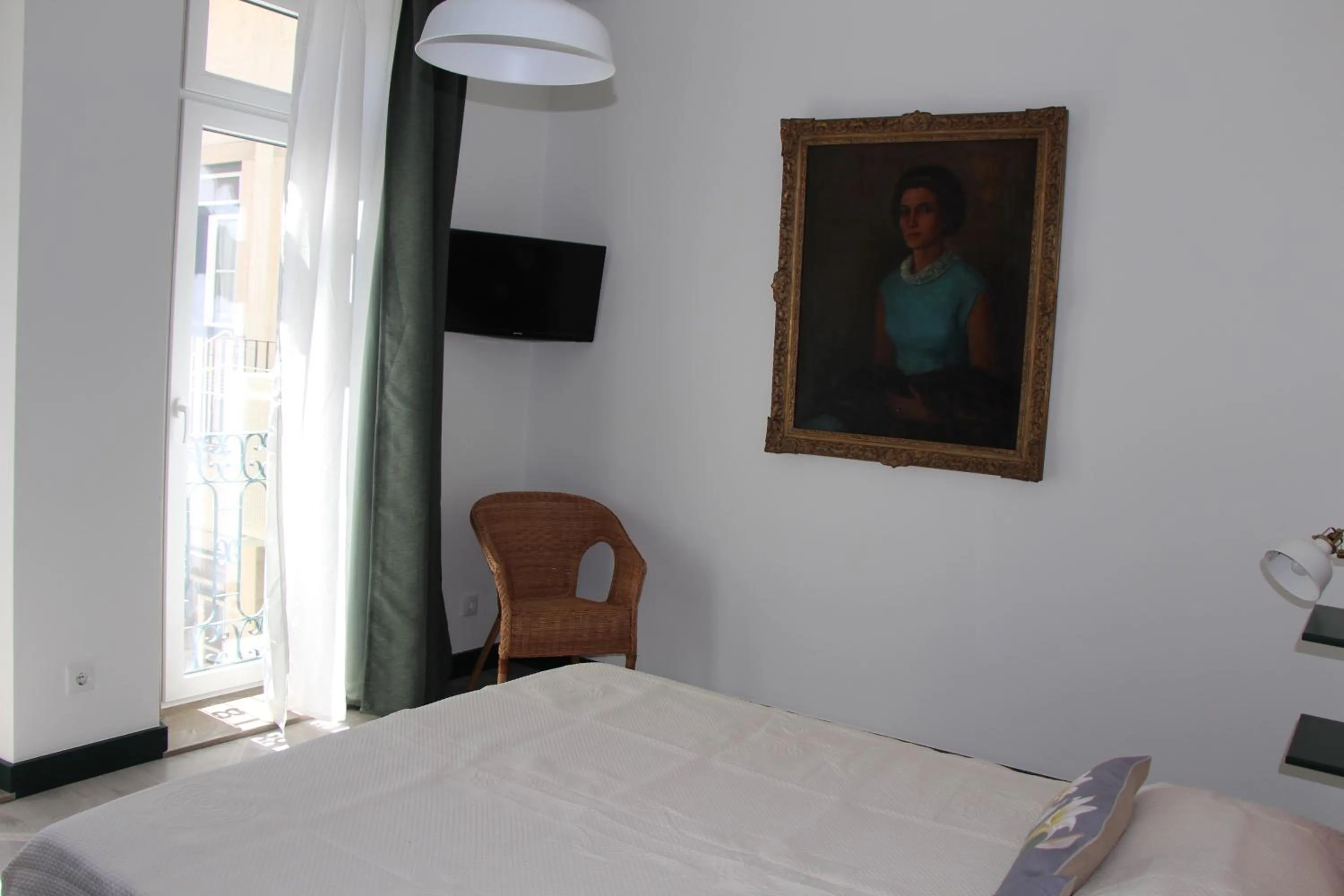 Bed in DoBairro suites at Bairro Alto