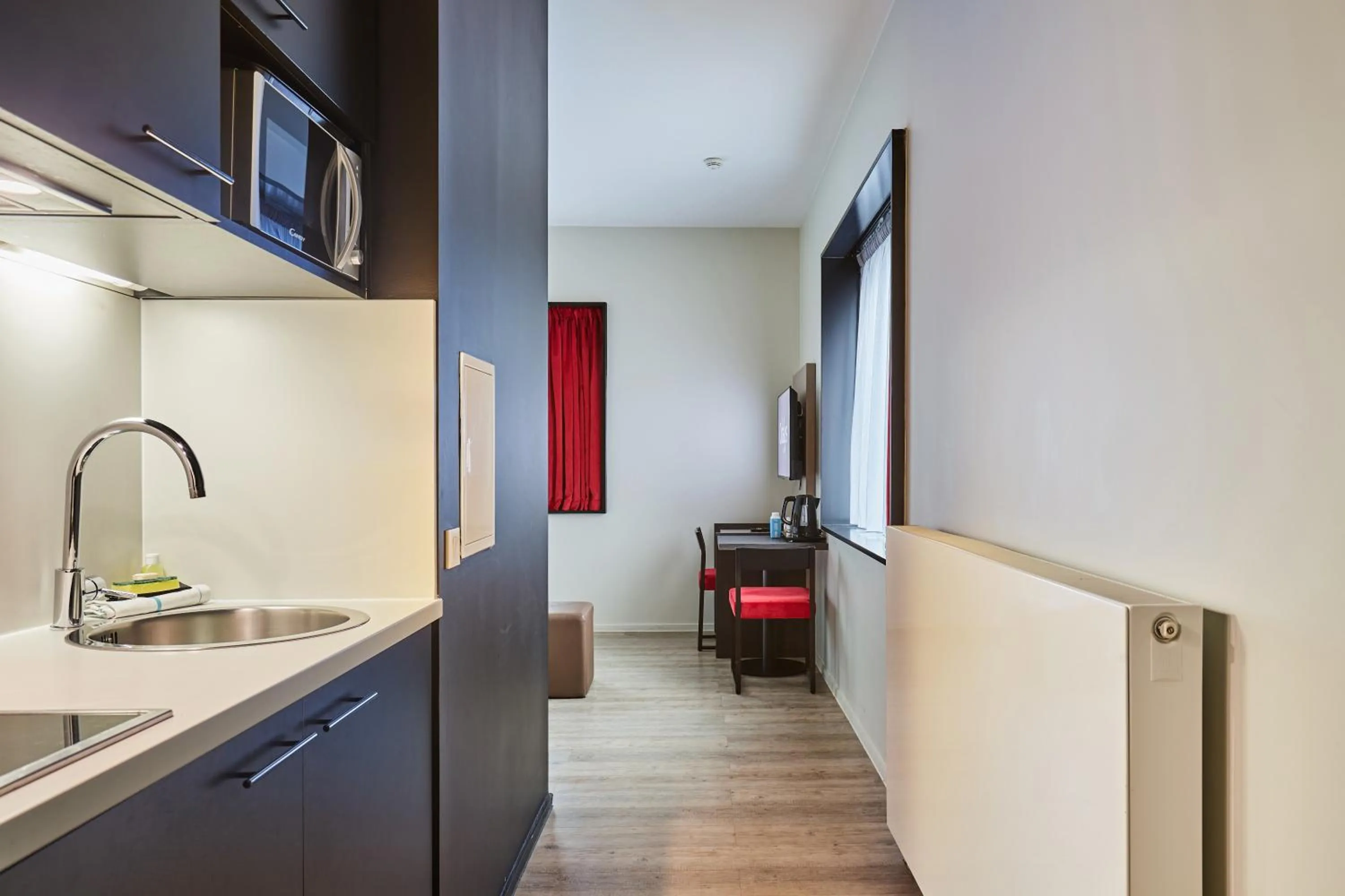 Kitchen or kitchenette in Appart Hotel Odalys City Paris XVII