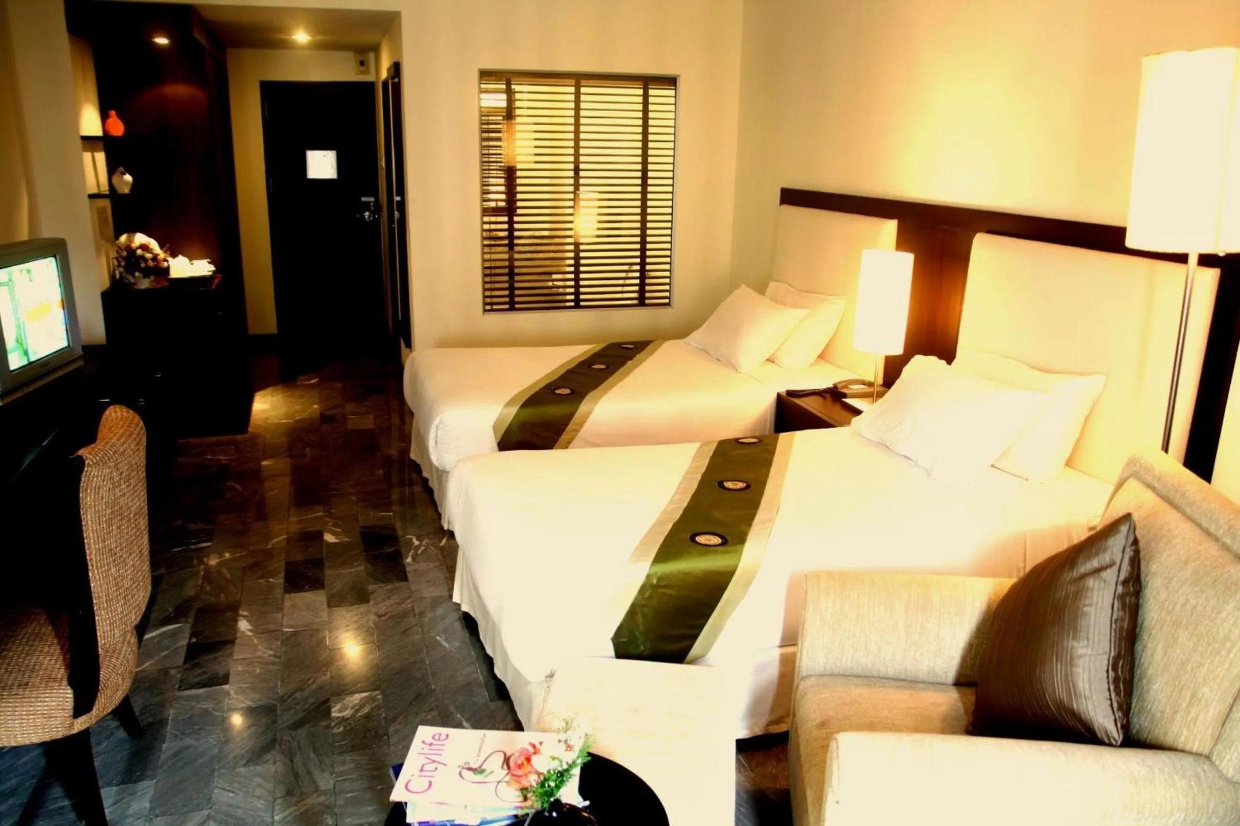 Bed in Royal Lanna Hotel