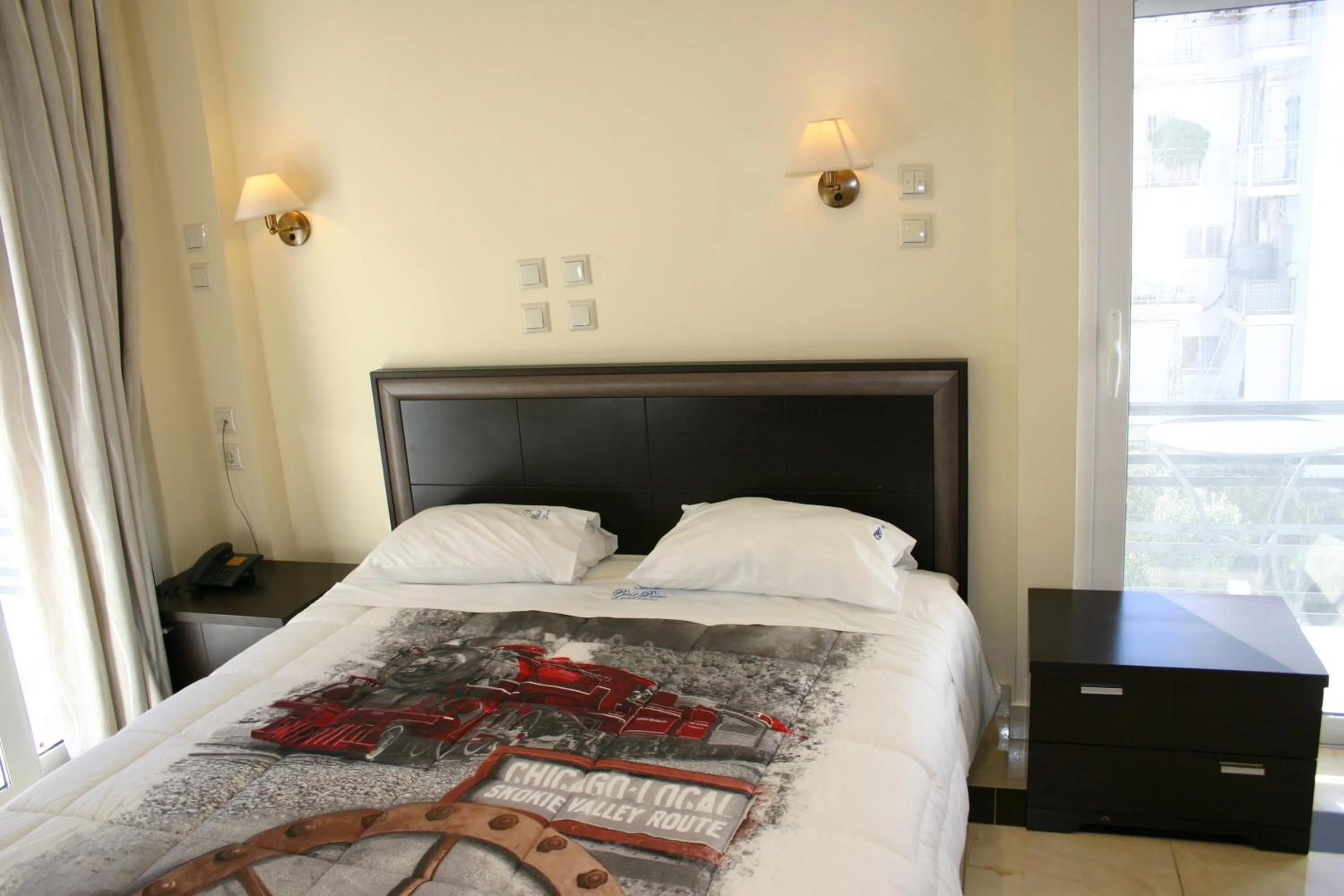 Bed in Petit Palais Hotel