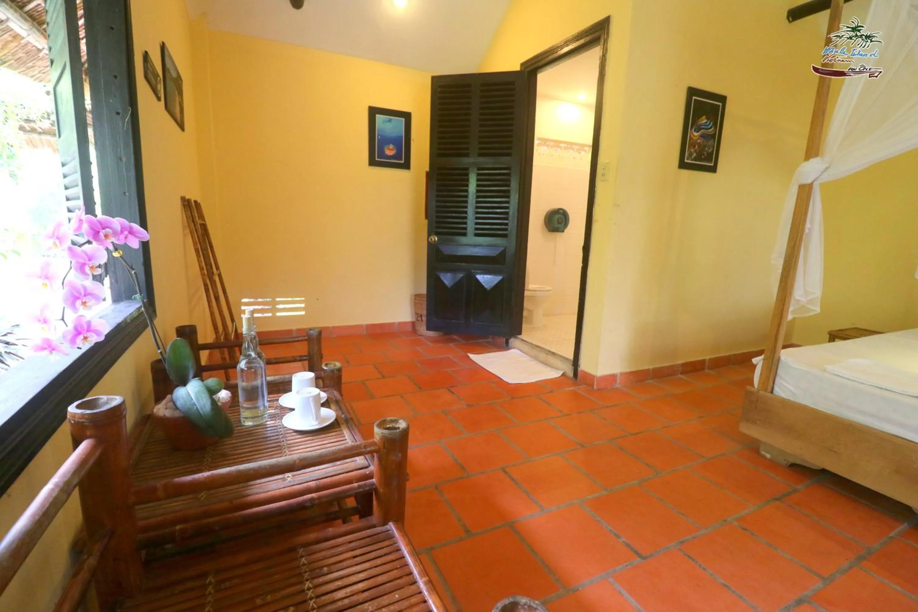 Seating area, Bed in Whale Island Resort