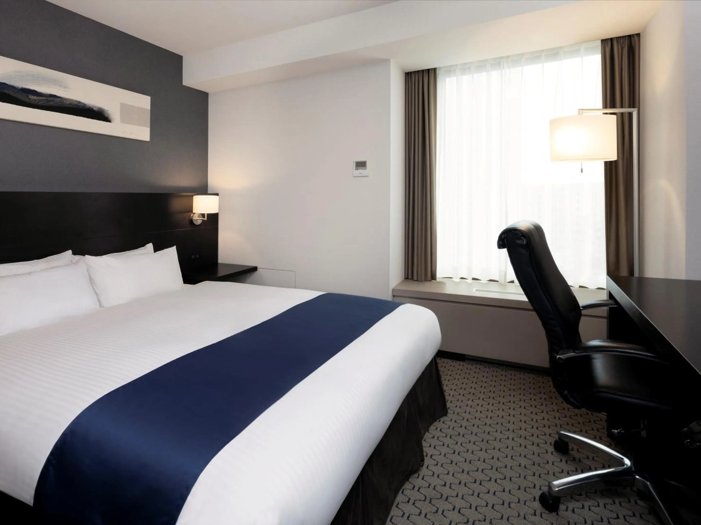 Photo of the whole room, Bed in Sapporo Grand Hotel