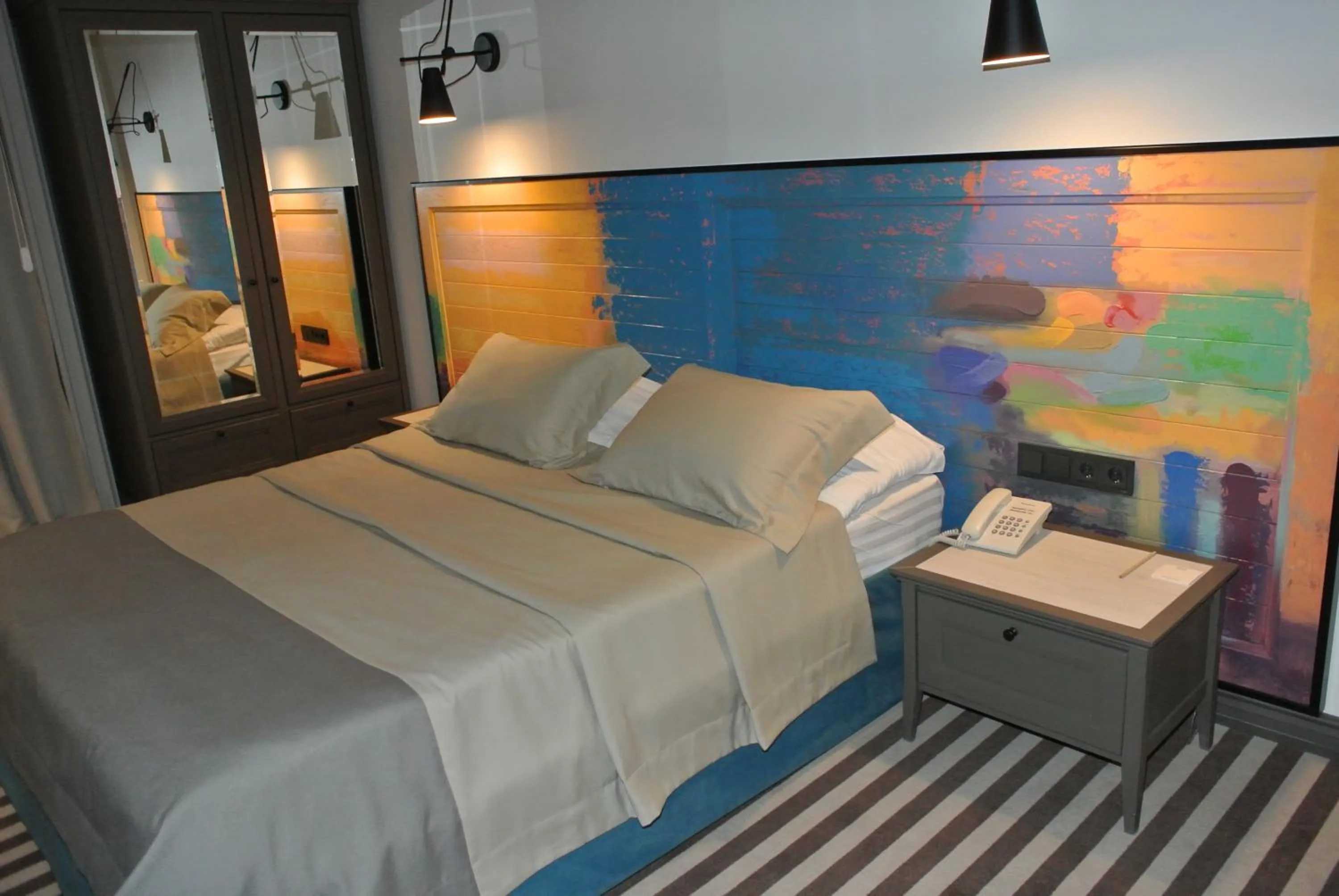 Bed in PANORAMA Lviv Hotel