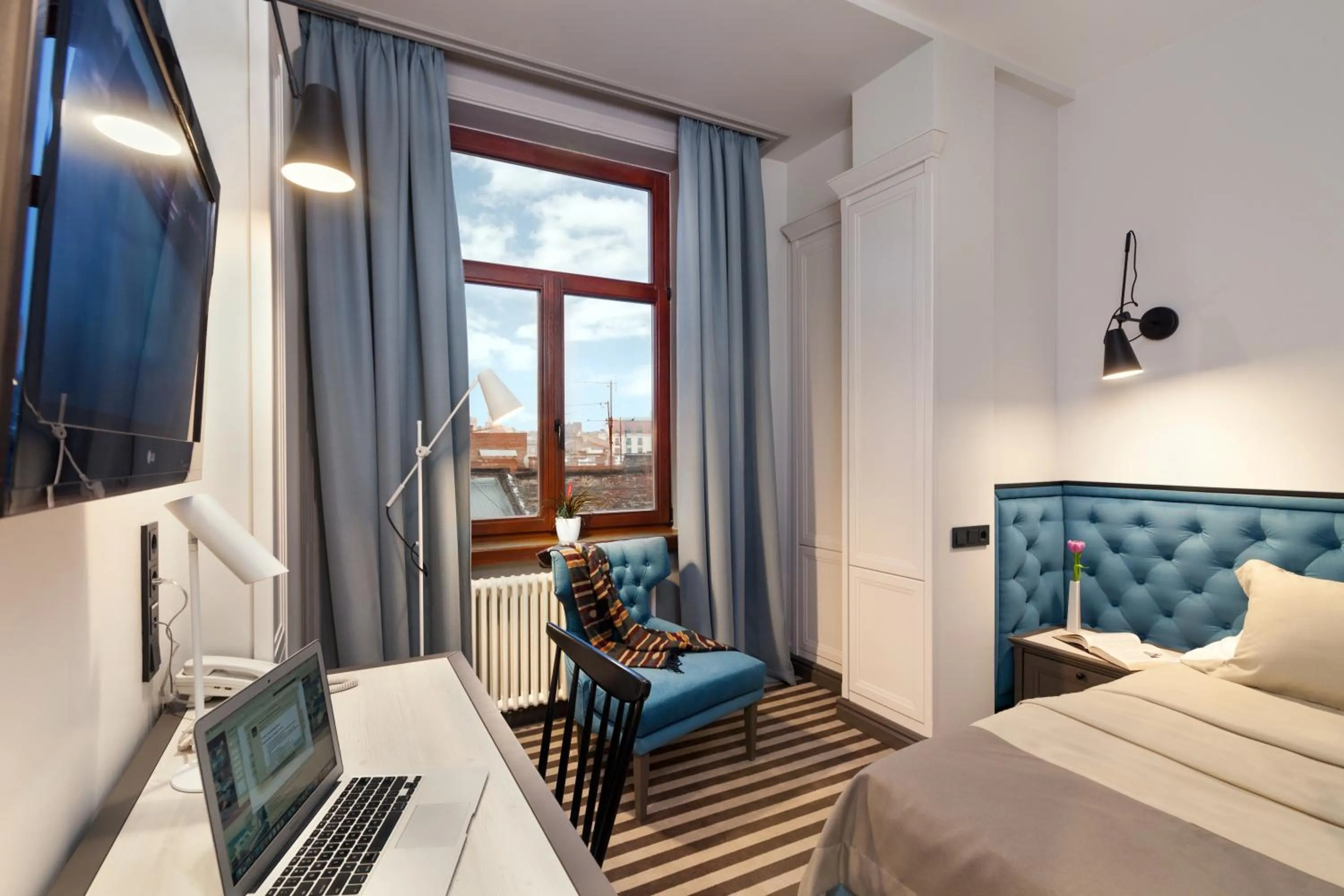 Photo of the whole room, Bed in PANORAMA Lviv Hotel