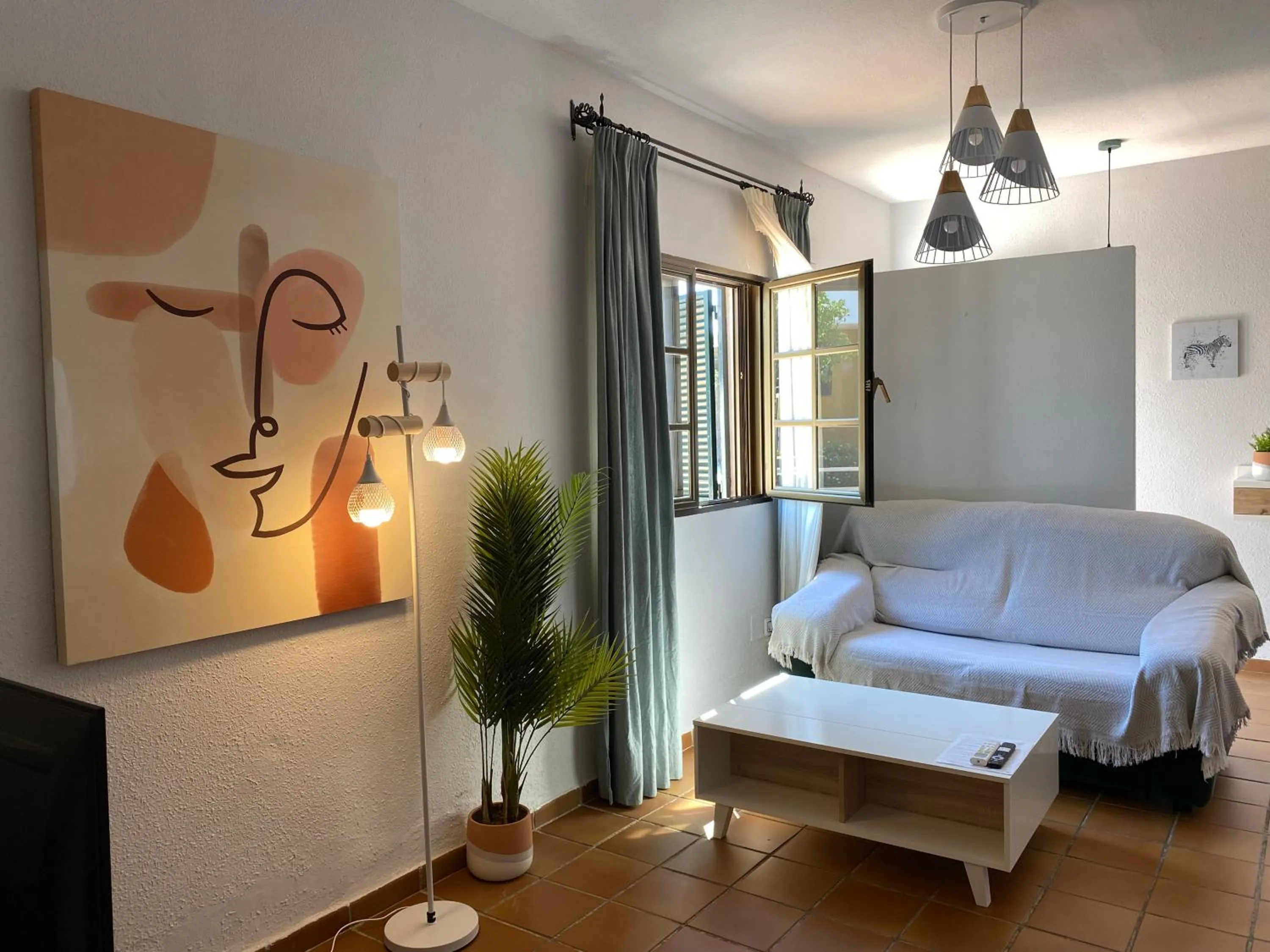 Living room, Bed in Apartamentos Atalayas Extremadura