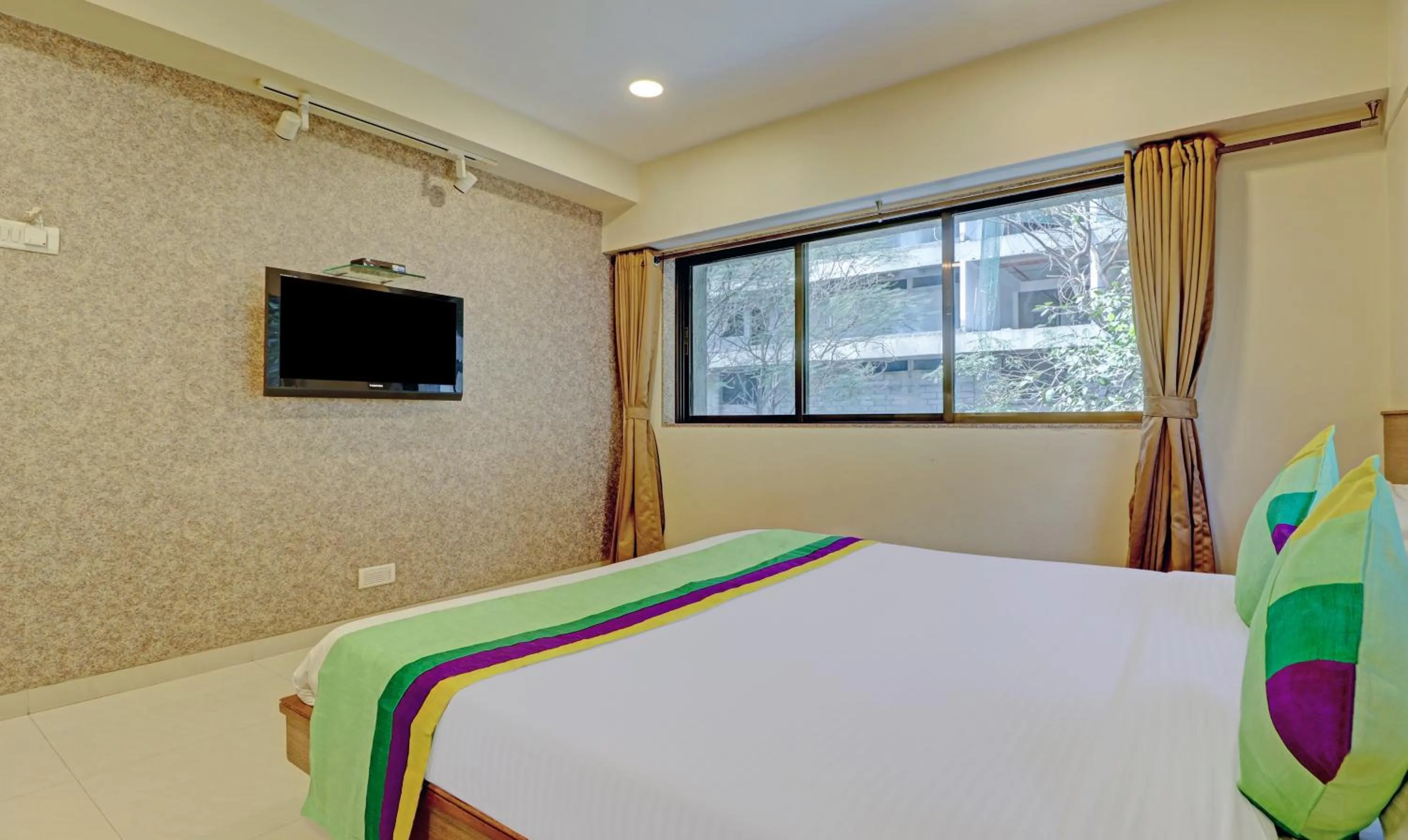 Bedroom, Bed in Treebo Vikrant Residency
