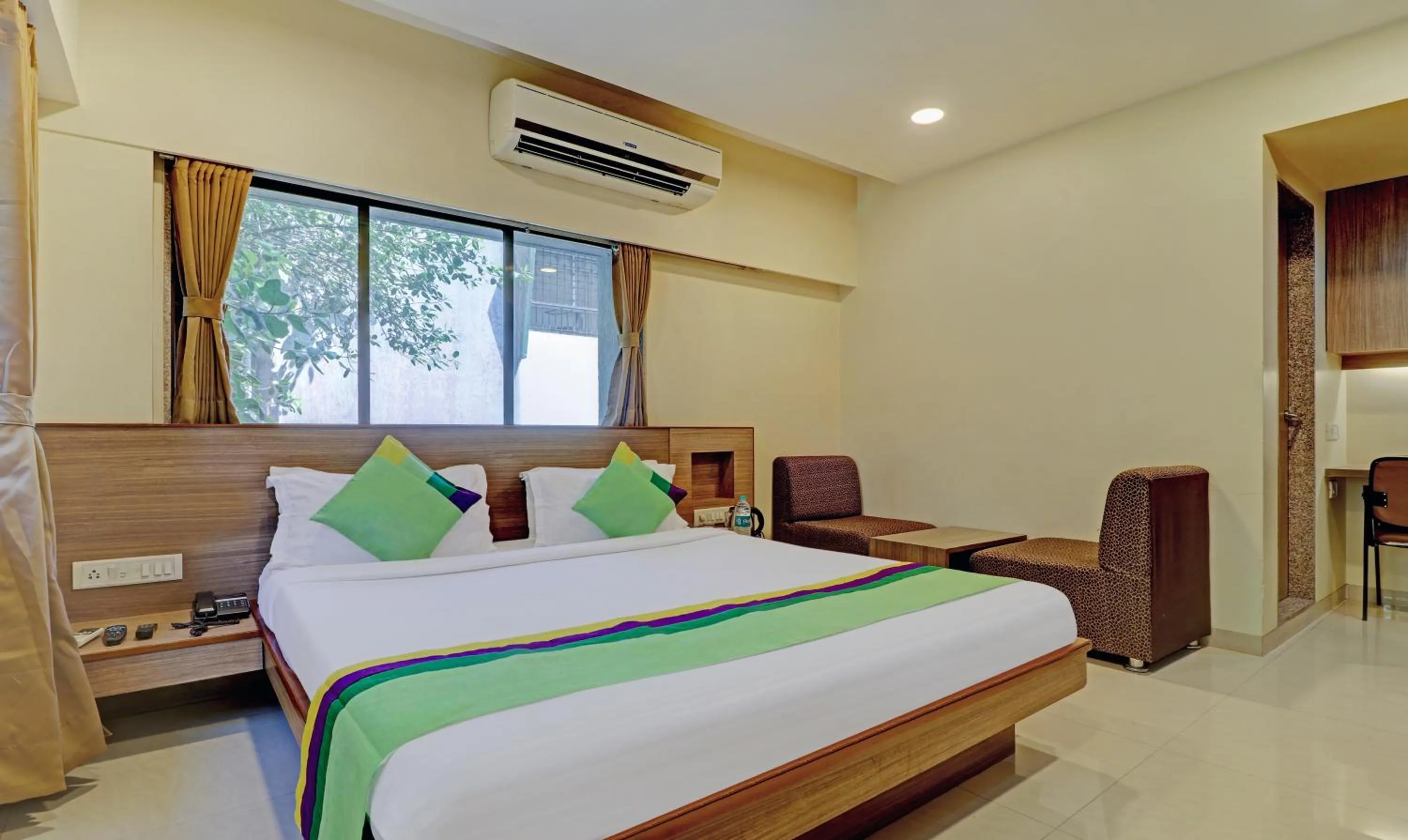 Bedroom, Bed in Treebo Vikrant Residency