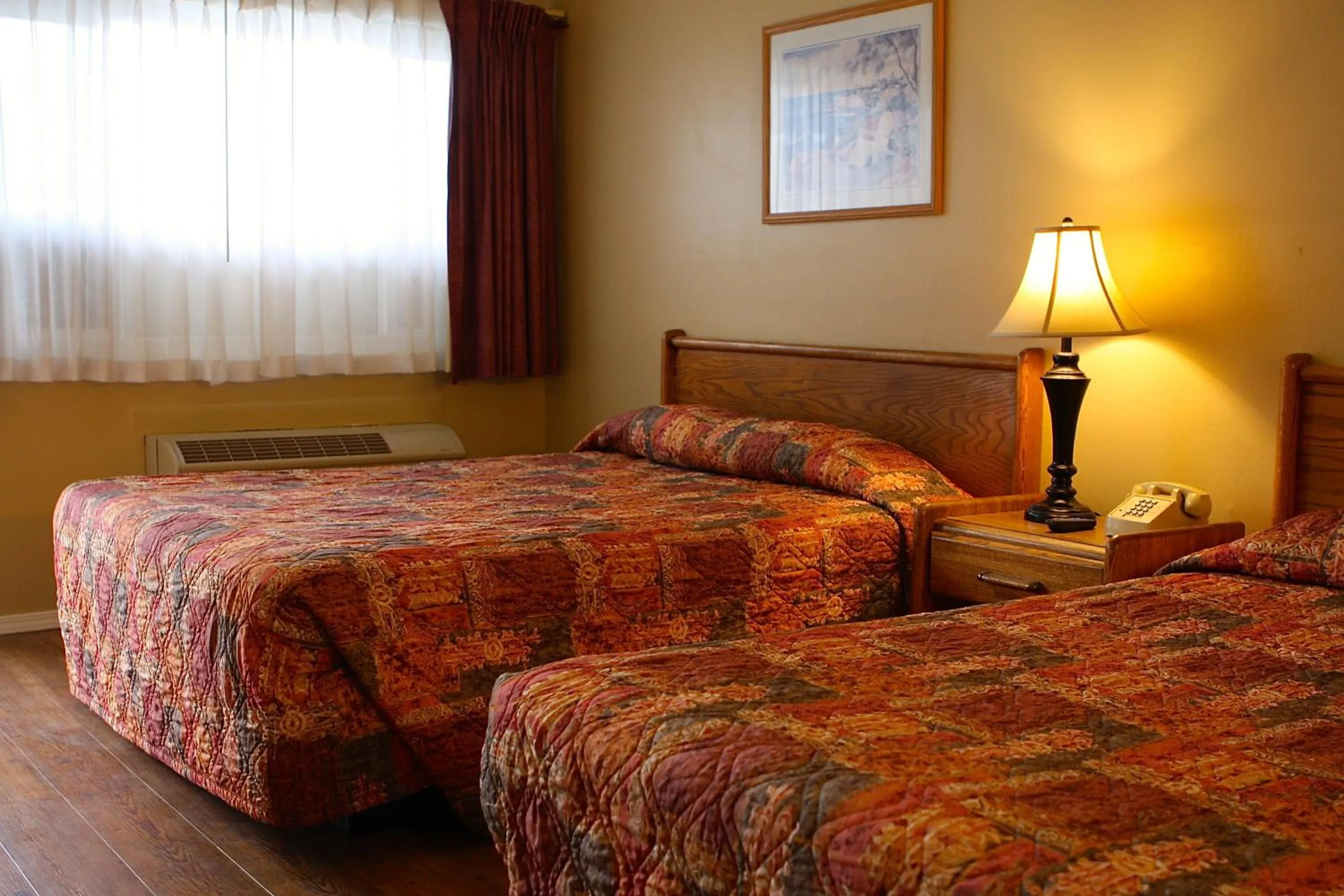 Bed in San Luis Inn and Suites