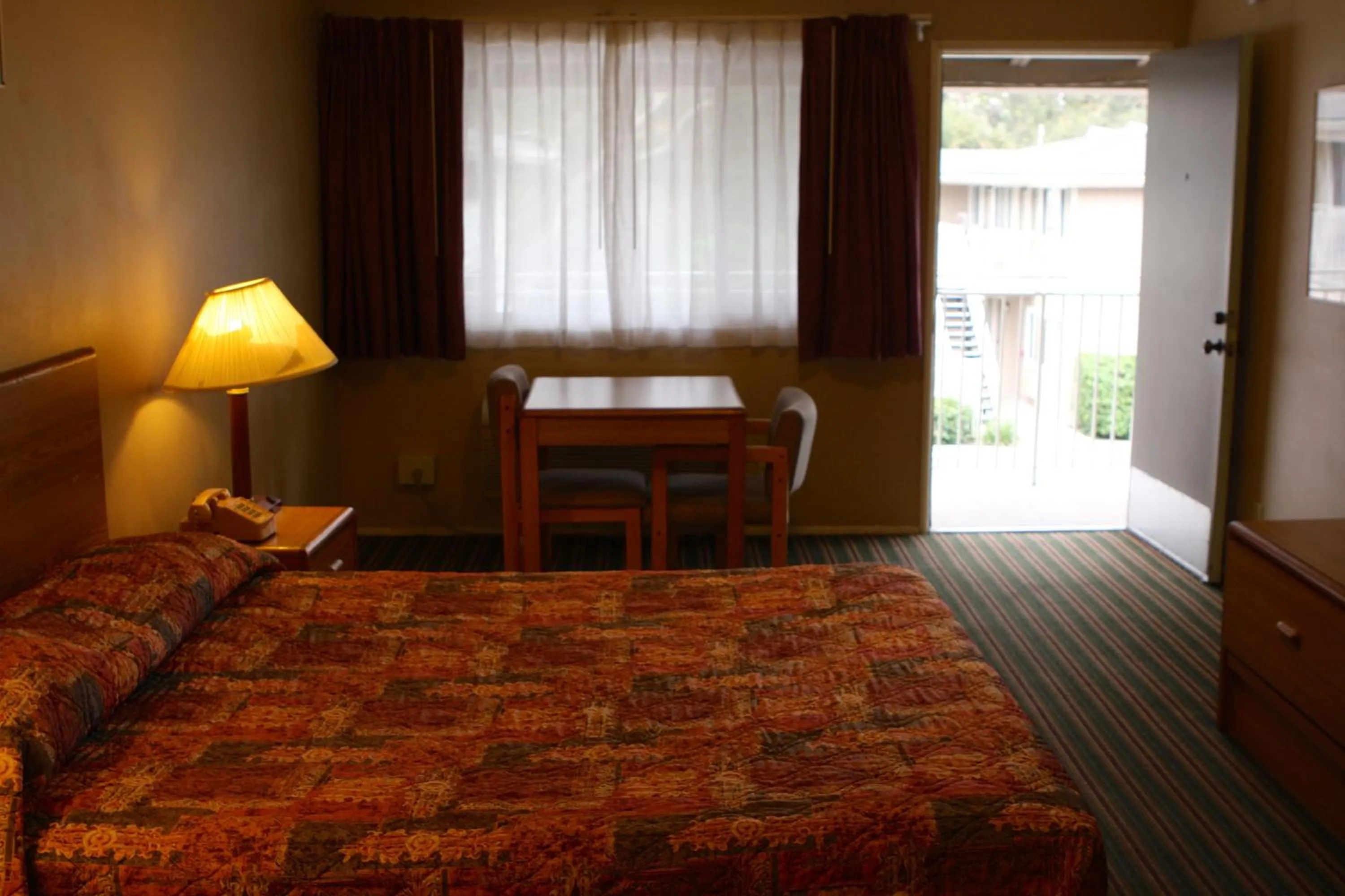 Bed in San Luis Inn and Suites