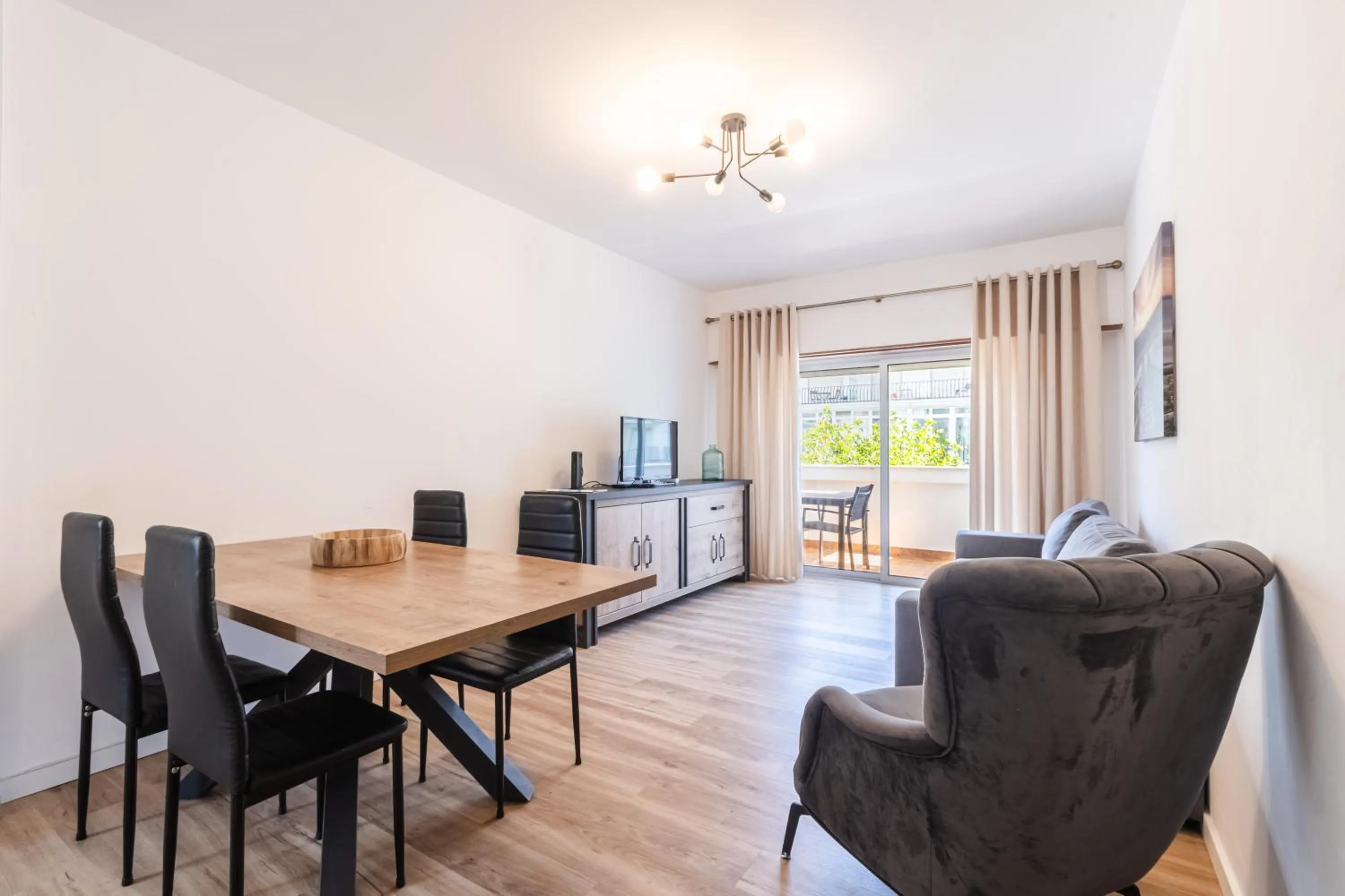 Living room in Torres Mira Praia by Garvetur