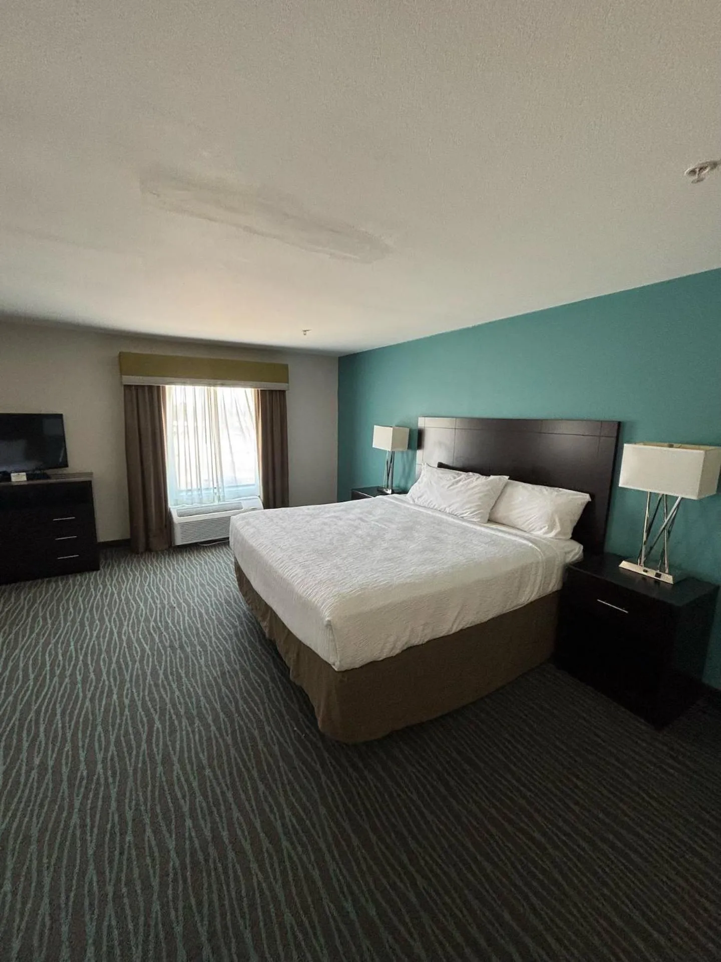 Bed in Ramada by Wyndham Burkburnett - Wichita Falls